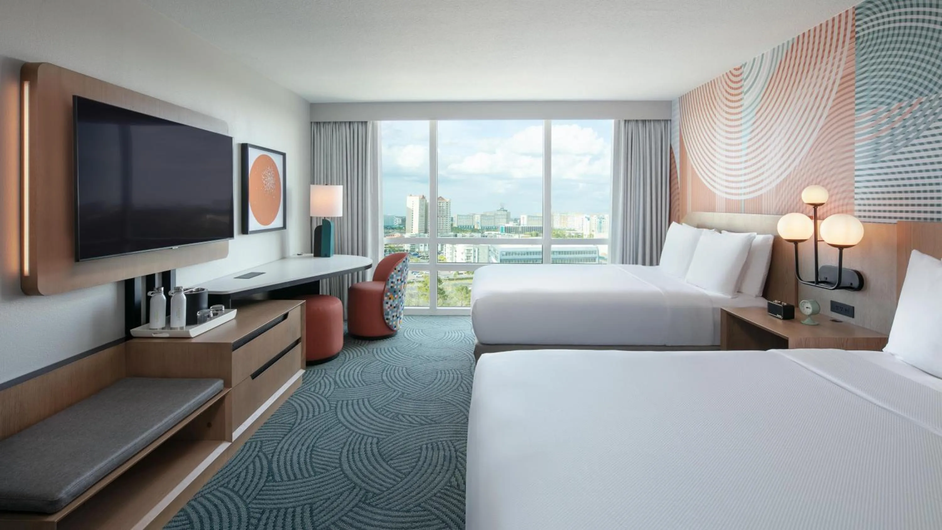 Deluxe Queen Room with Two Queen Beds and Skyline View in Hotel Kinetic Orlando Universal Blvd