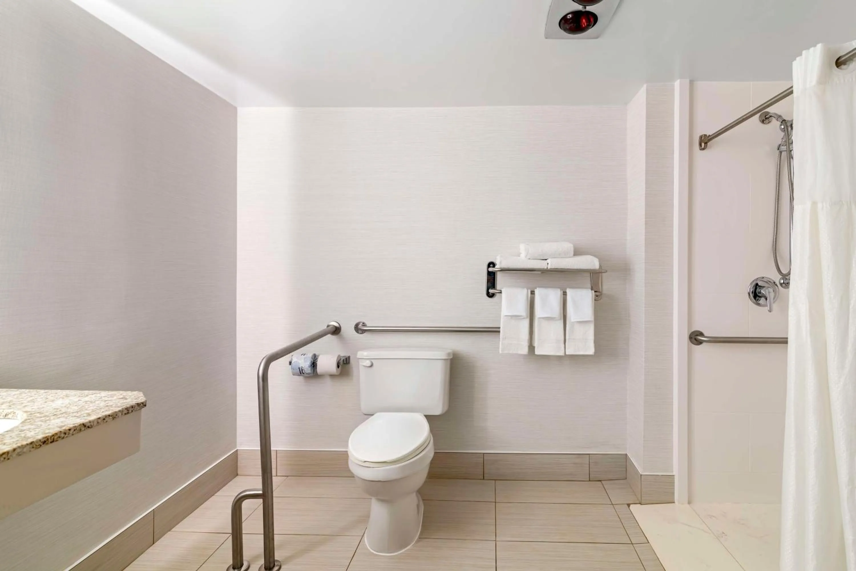 King Room with Mobility Accessible Roll-In Shower in Best Western Springfield Hotel