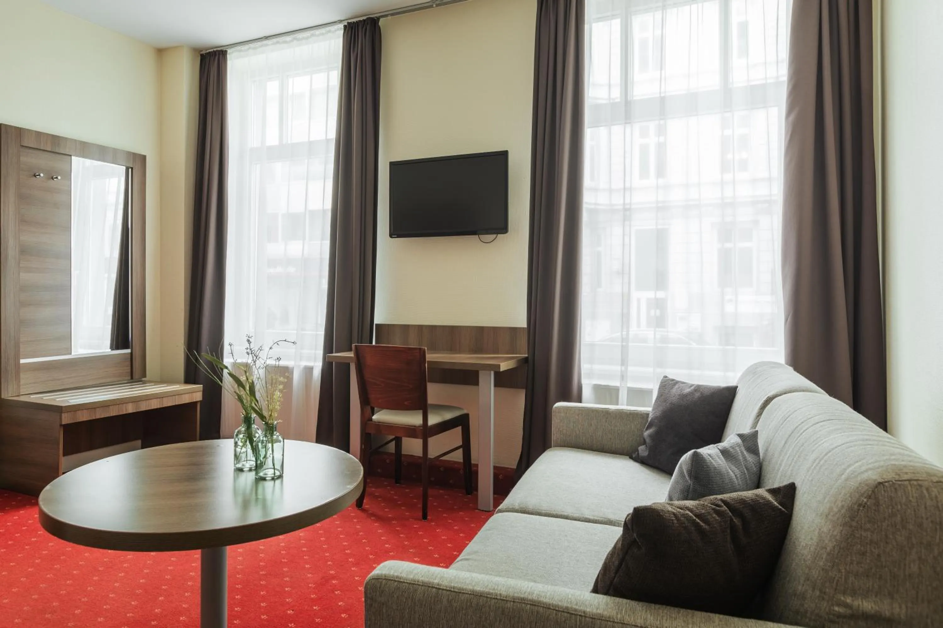 Comfort Quadruple Room in acora City Apart Living the City