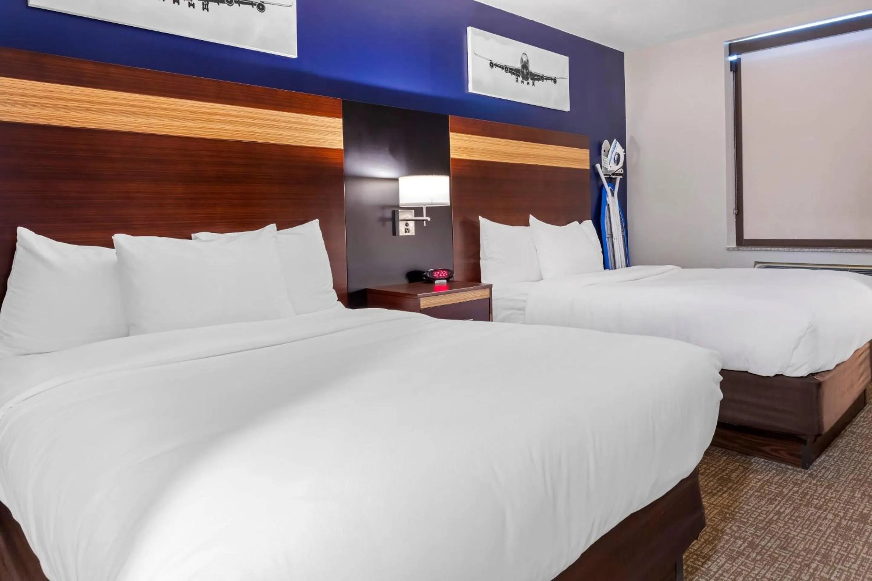 2 Double Beds in Avion Inn Near LGA Airport, an Ascend Collection Hotel
