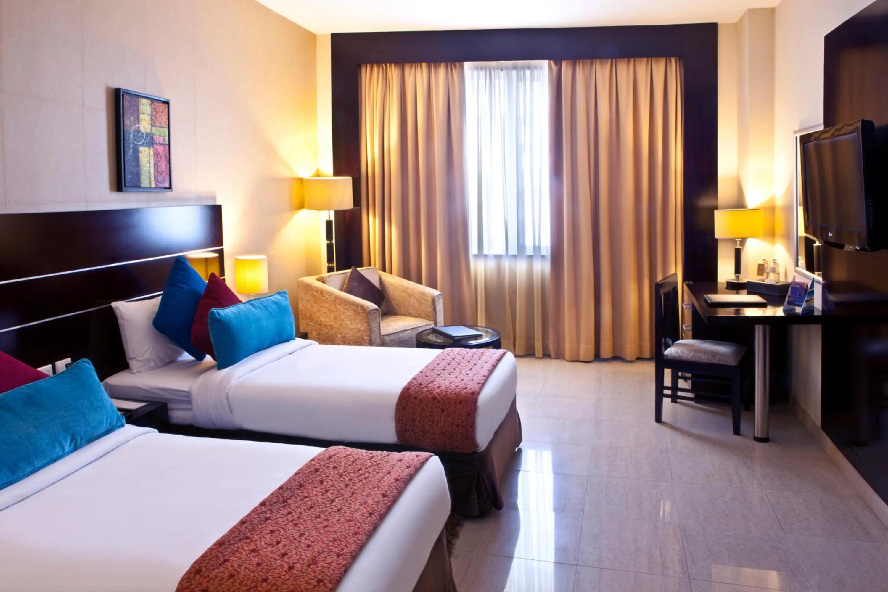Twin Room in Landmark Riqqa Hotel