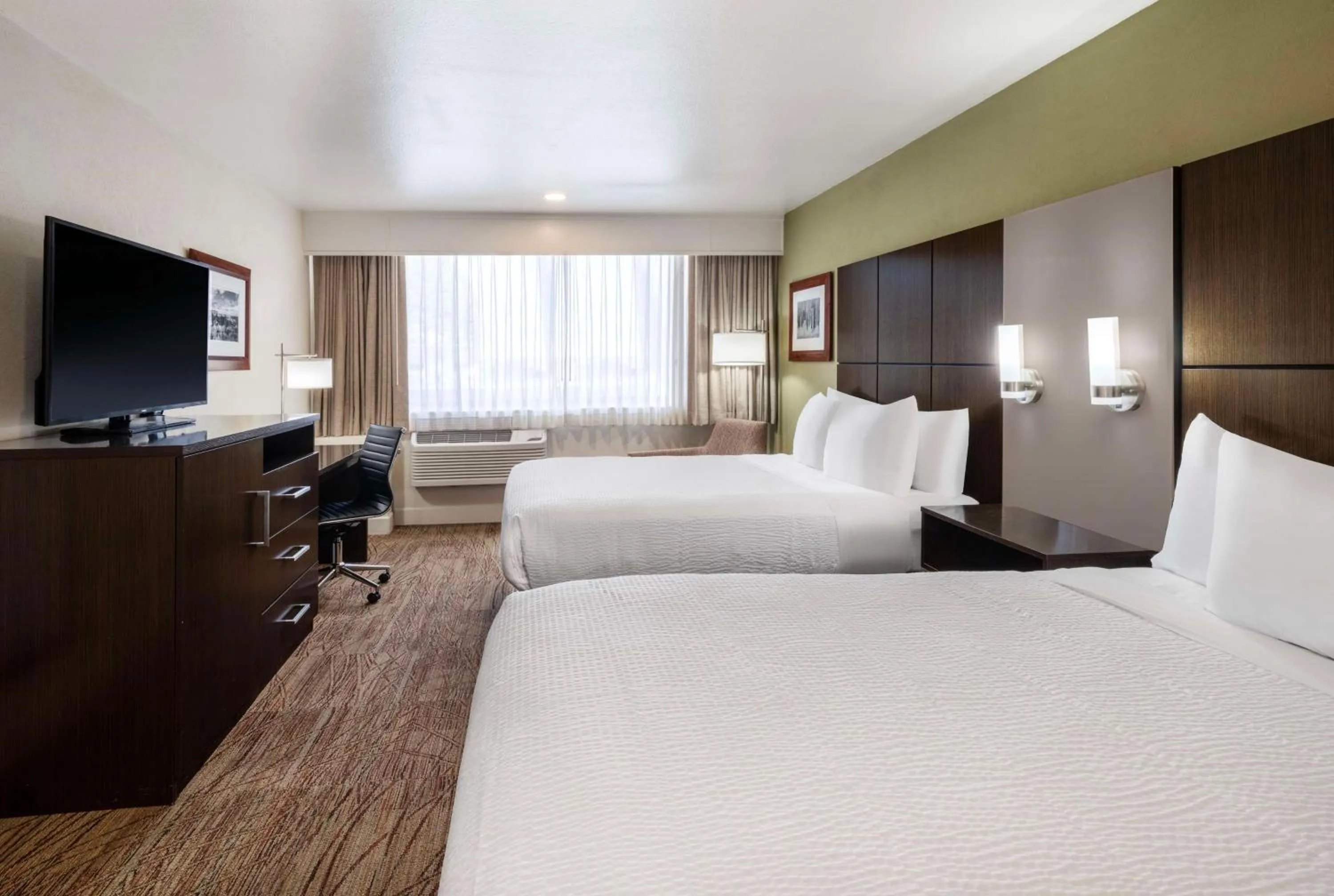 Queen Room with Two Queen Beds - Hearing Accessible in Best Western Pony Soldier Inn & Suites