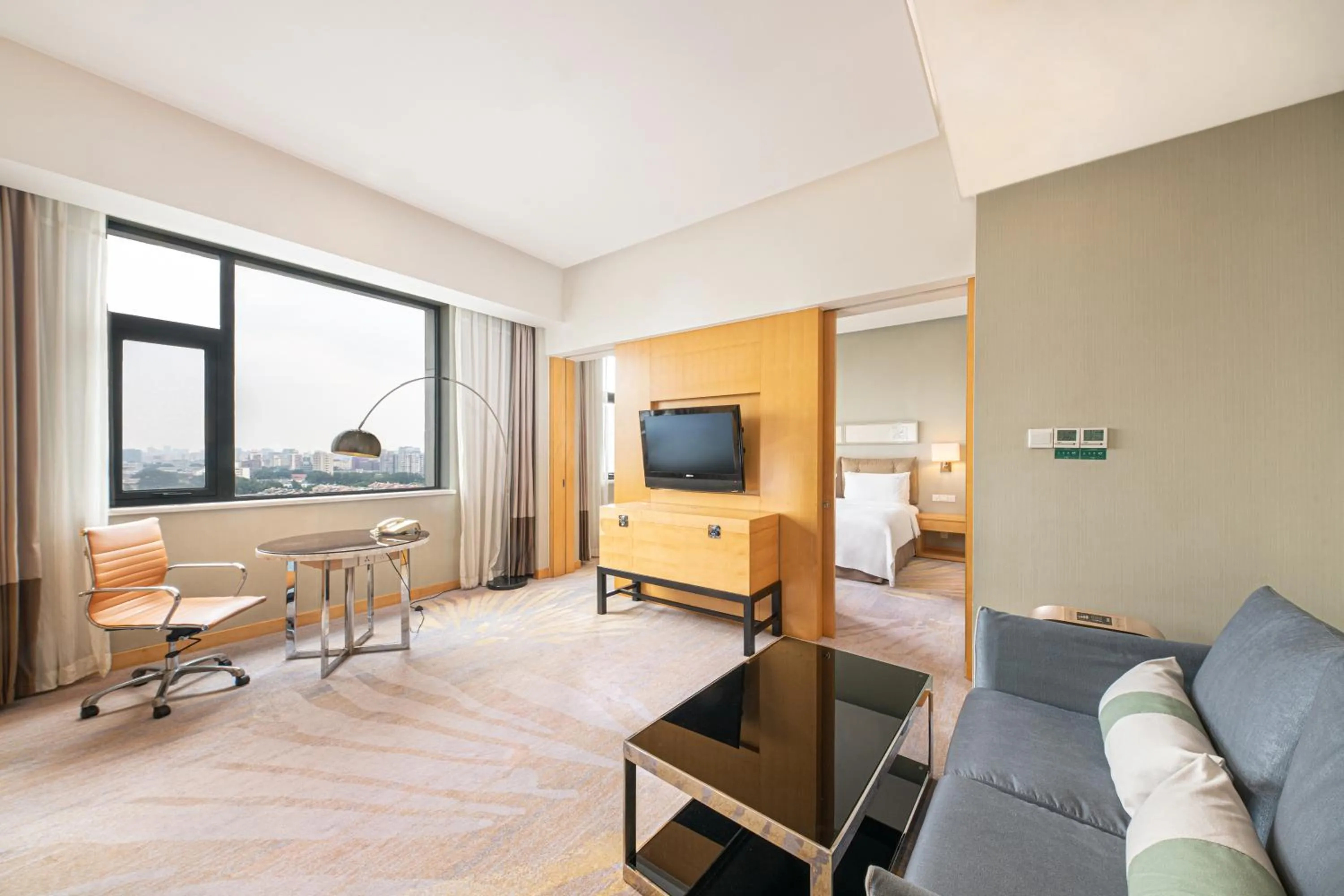 One-Bedroom Suite Lounge Access in Holiday Inn Beijing Deshengmen by IHG on 2nd Ring Road Extension 10-15 minute taxi ride to Shichahai Lama Temple Drum Tower Close to Beijing North Station for Badaling Great Wall Near Exit B Jishuitan Metro Line 2