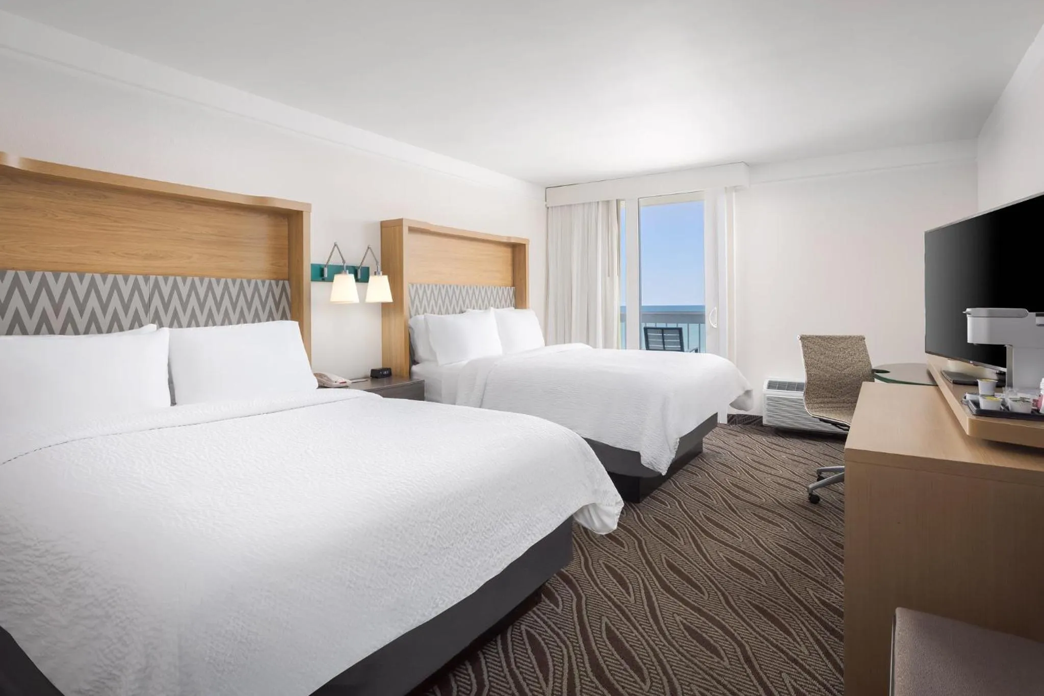 Standard Queen Room with Two Queen Beds and Balcony in Holiday Inn Resort Oceanfront at Surfside Beach by IHG