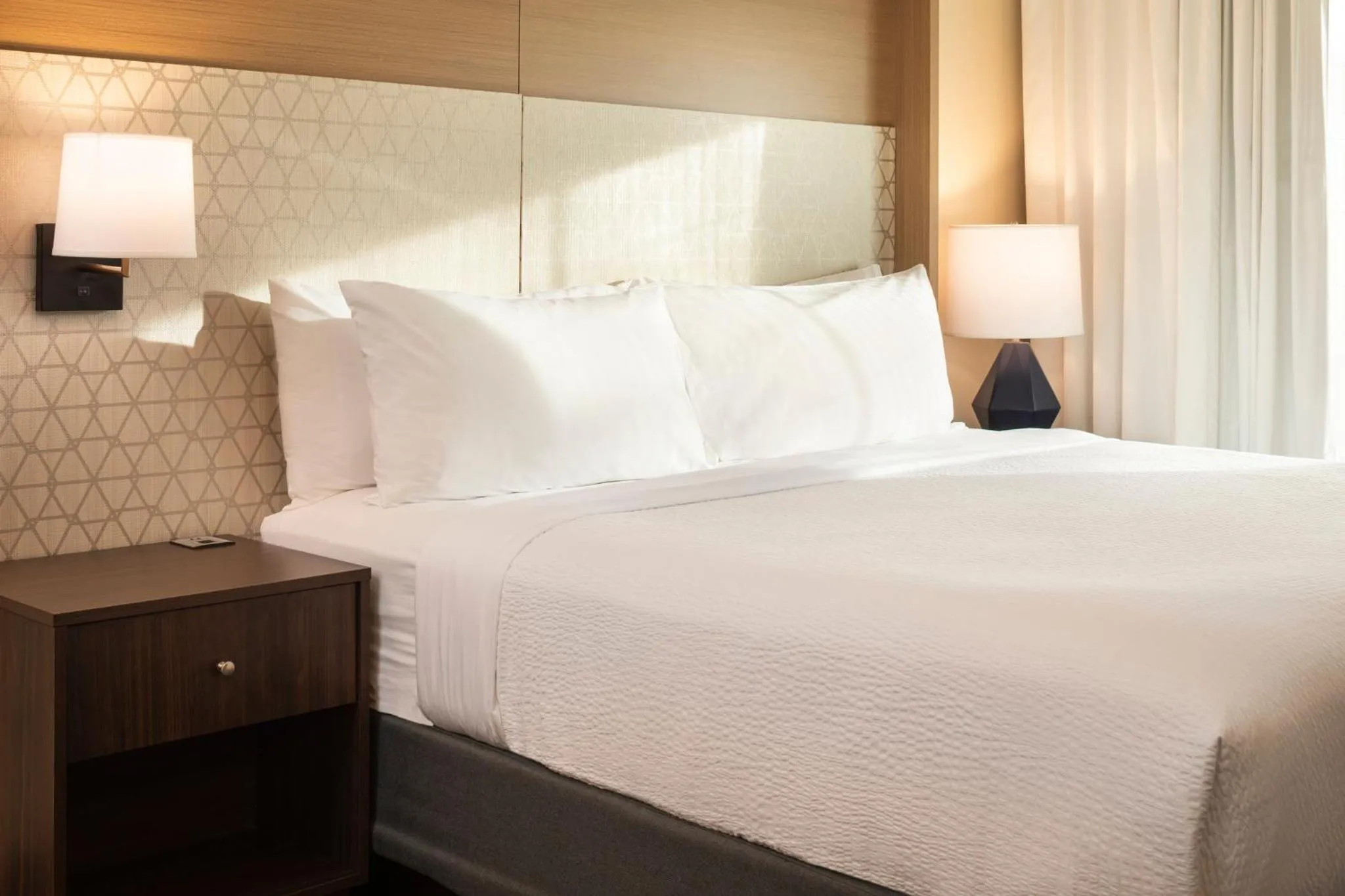 One-Bedroom Family Room with One King Bed and One Bunk Bed in Holiday Inn Hotel & Suites Maple Grove Northwest Minneapolis-Arbor Lakes by IHG