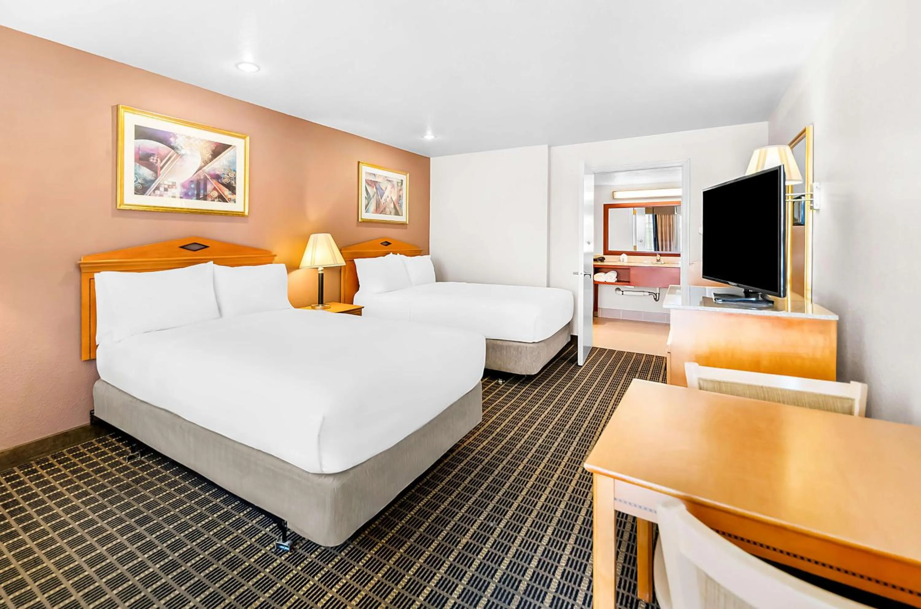Double Room with Two Double Beds and Bath Tub - Disability Access in SureStayPlus Hotel by Best Western San Jose Central City