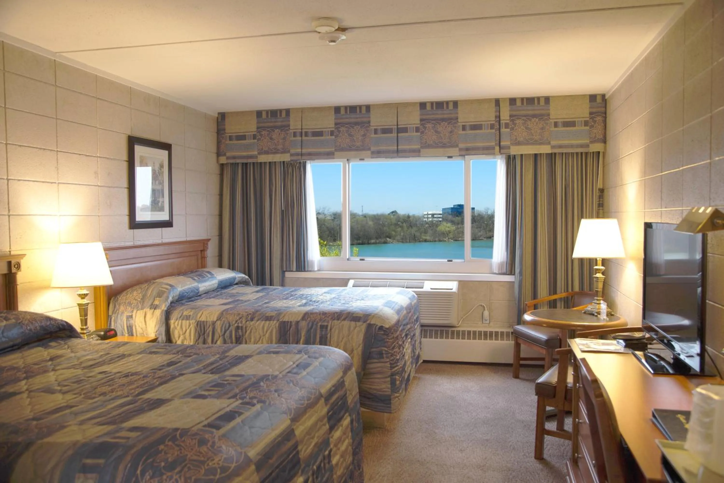 Queen Room with Two Queen Beds - Non-Smoking in Capri Inn