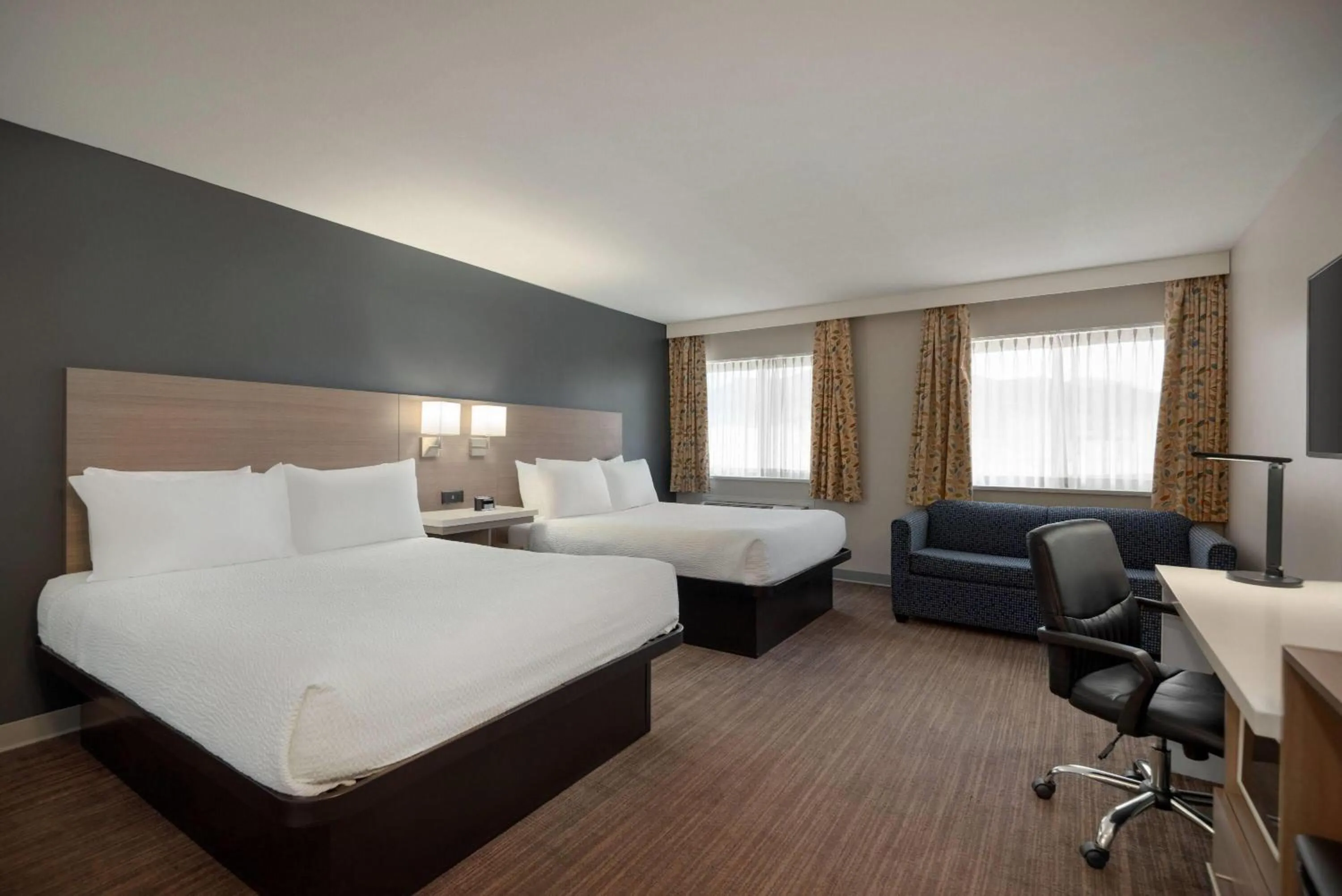 Deluxe Queen Room with Two Queen Beds - Non-Smoking in Days Inn by Wyndham Kelowna