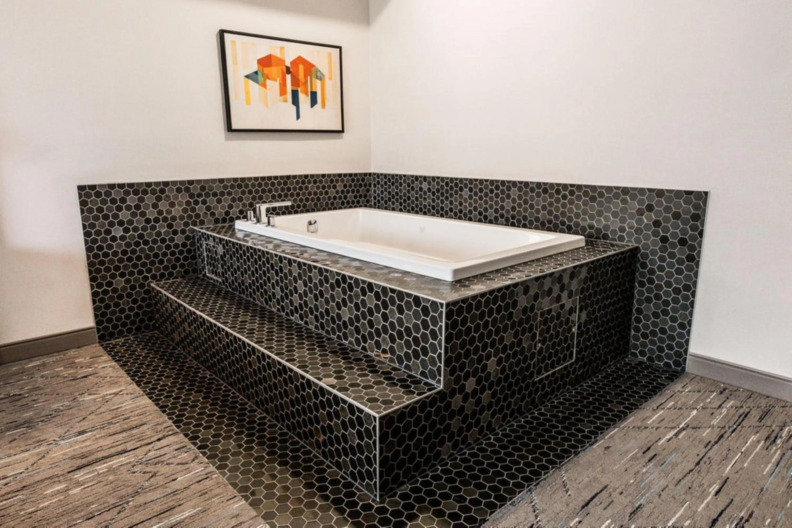 King Suite with Jetted Tub and Fireplace in Holiday Inn Express Calgary South by IHG