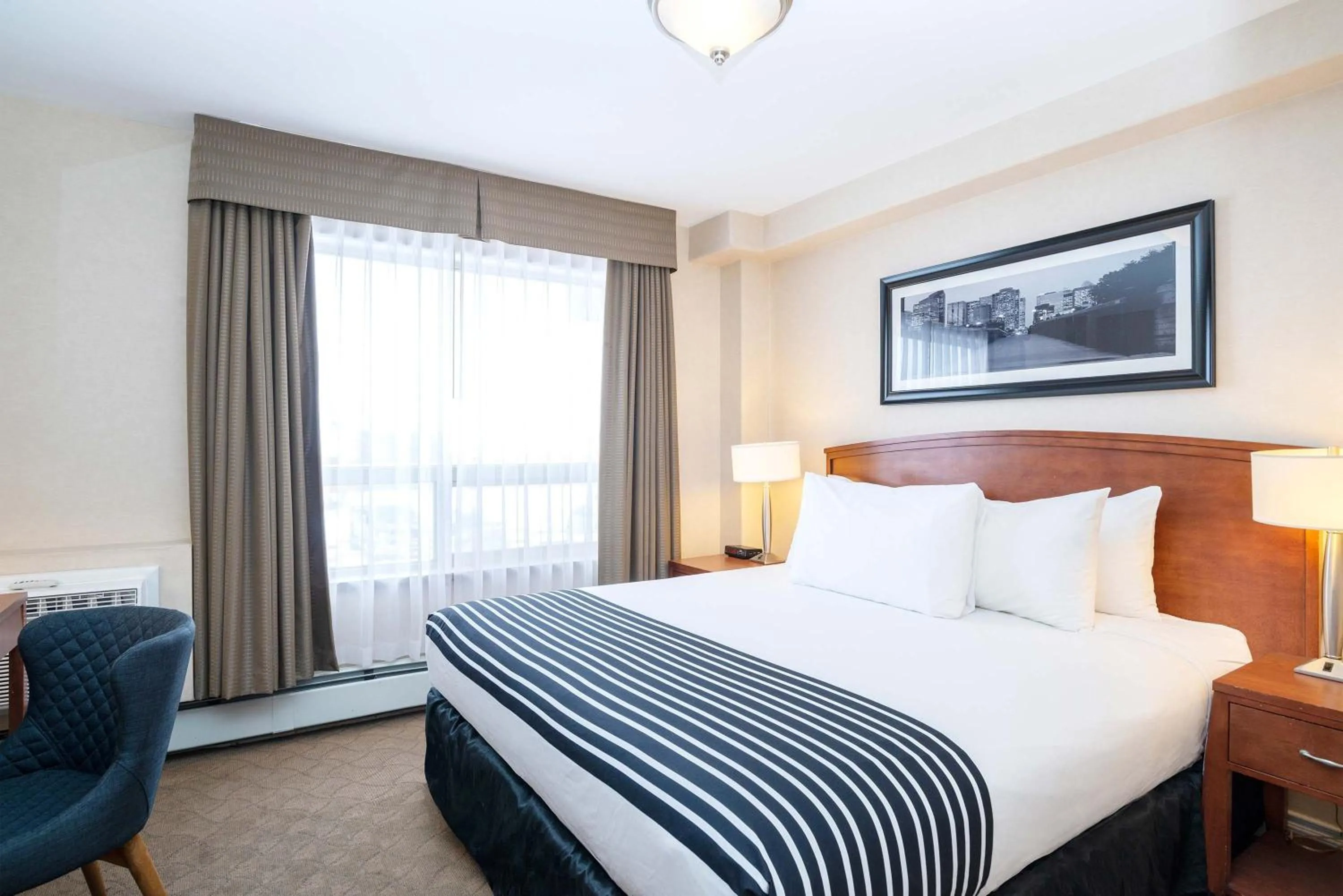 Family Suite, 1 King Bed, 2 Single Beds, Kitchenette in Sandman Hotel & Suites Calgary West