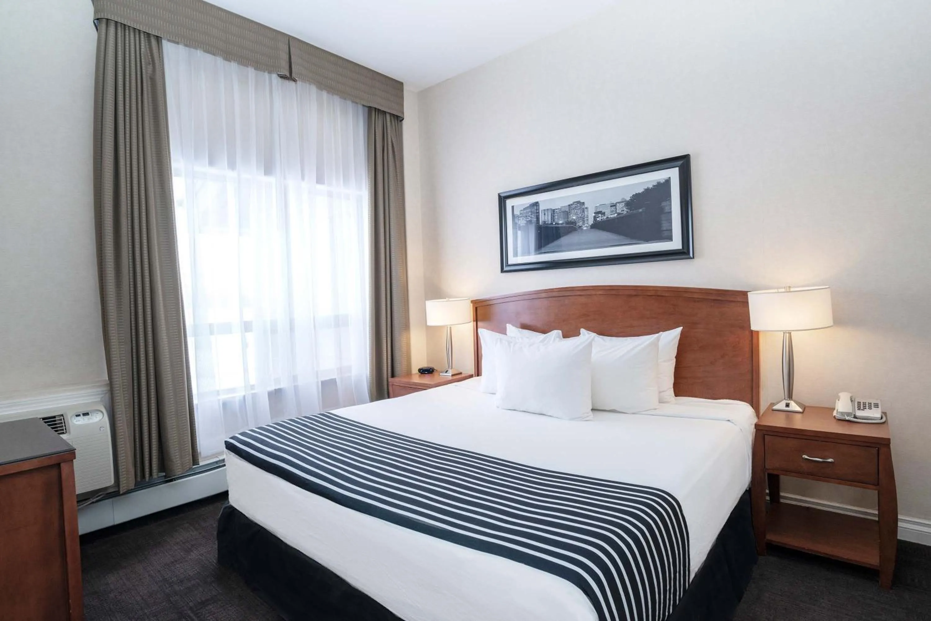 Balcony Suite, 1 King Bed, Sofa Bed, Kitchenette in Sandman Hotel & Suites Calgary West