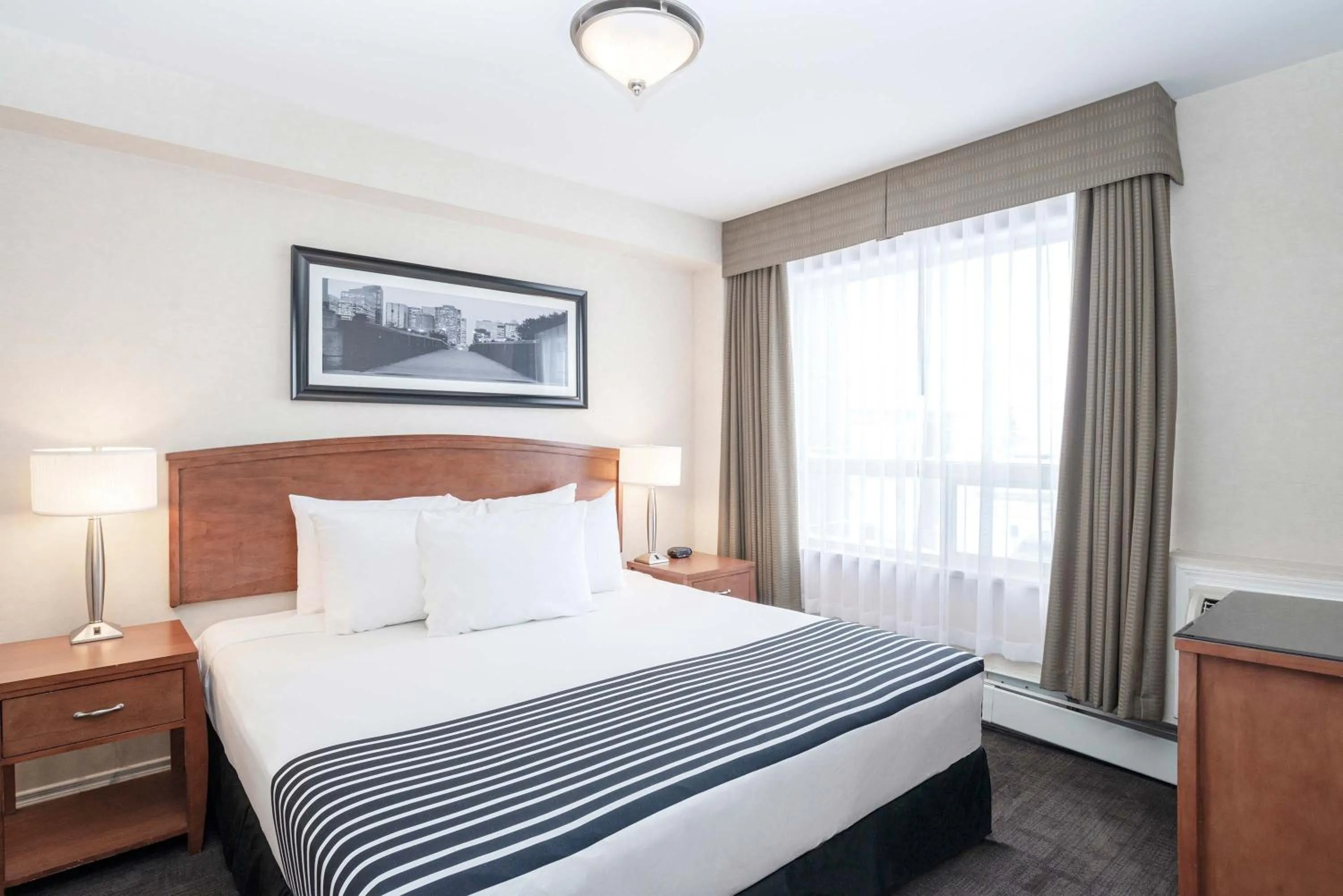 Grand Suite, 1 King Bed, Sofa Bed, Kitchenette in Sandman Hotel & Suites Calgary West