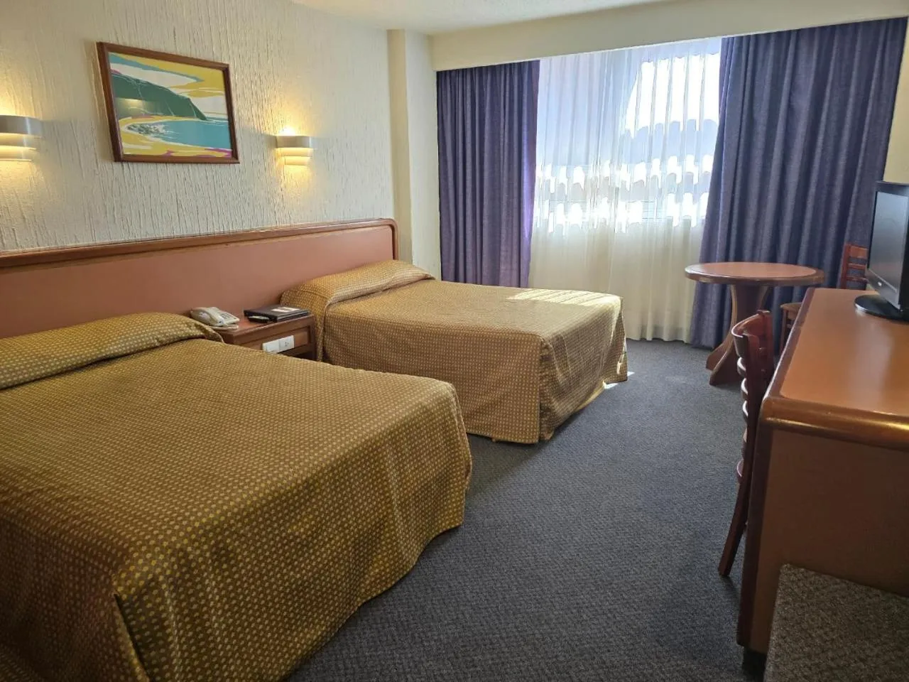 Classic Triple Room in Hotel Metropol