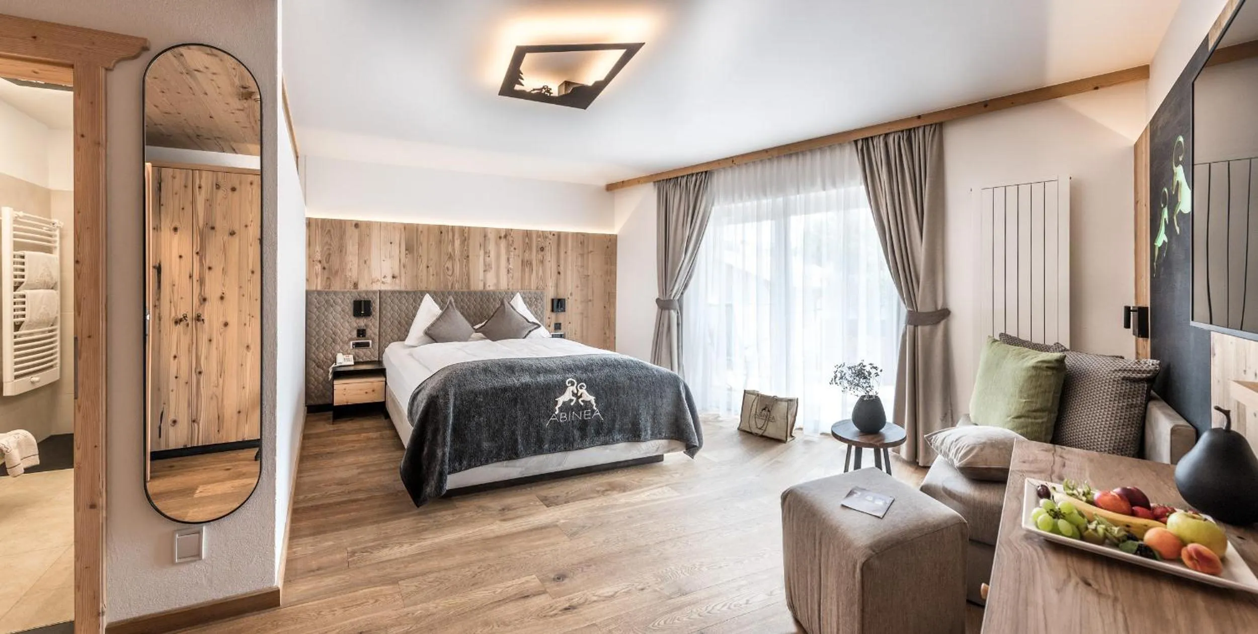 Quadruple Room in ABINEA Dolomiti Romantic SPA