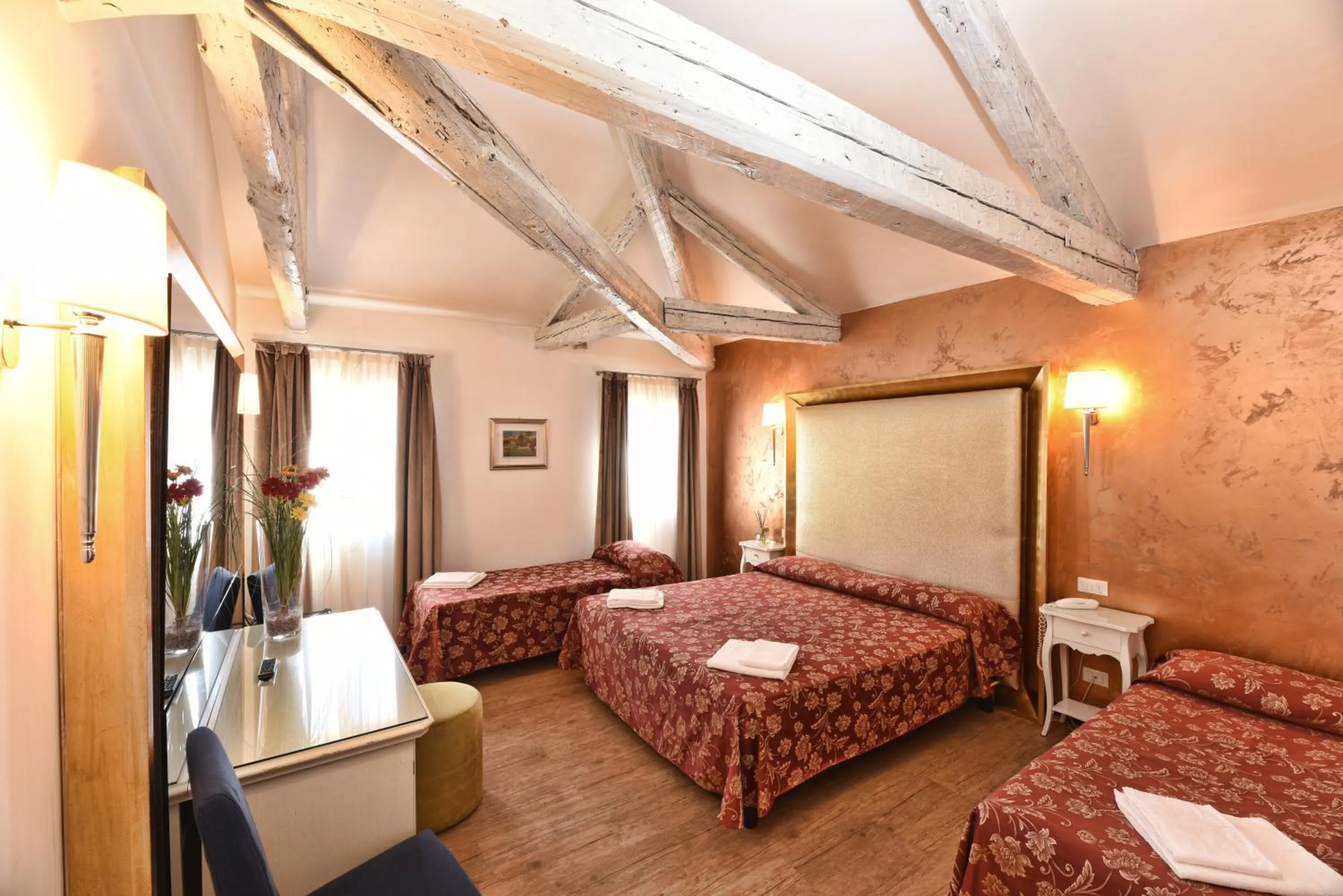 Deluxe Quadruple Room in Locanda Casa Martini