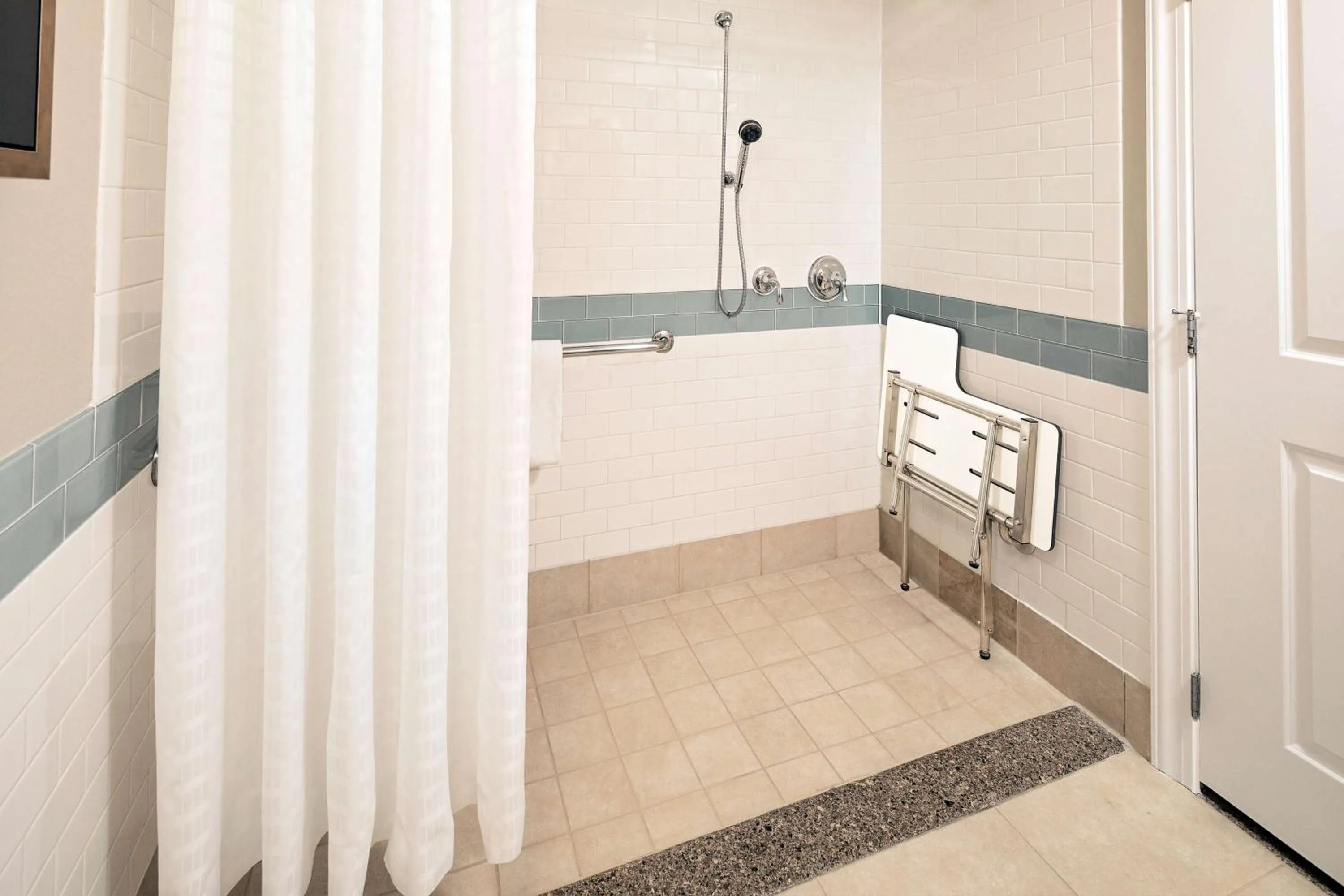 King Studio with Roll-In Shower - Mobility Accessible in Hilton Grand Vacations Club Parc Soleil Orlando