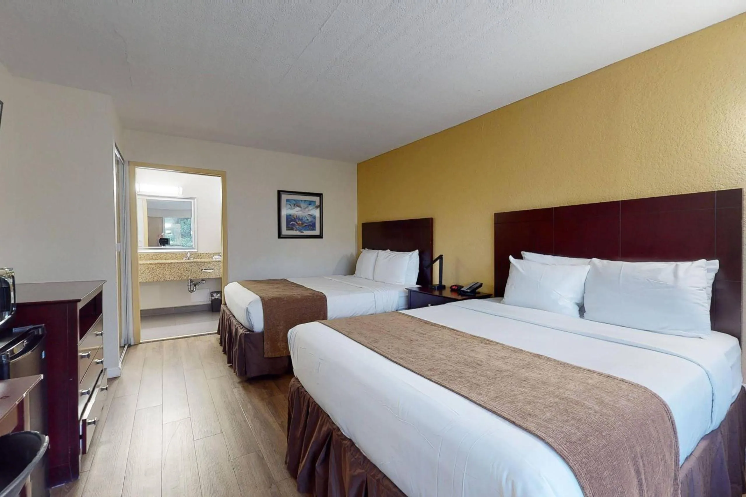 Queen Room with Two Queen Beds with Parking Lot View - Non-Smoking in Rodeway Inn & Suites Fort Lauderdale Airport & Cruise Port