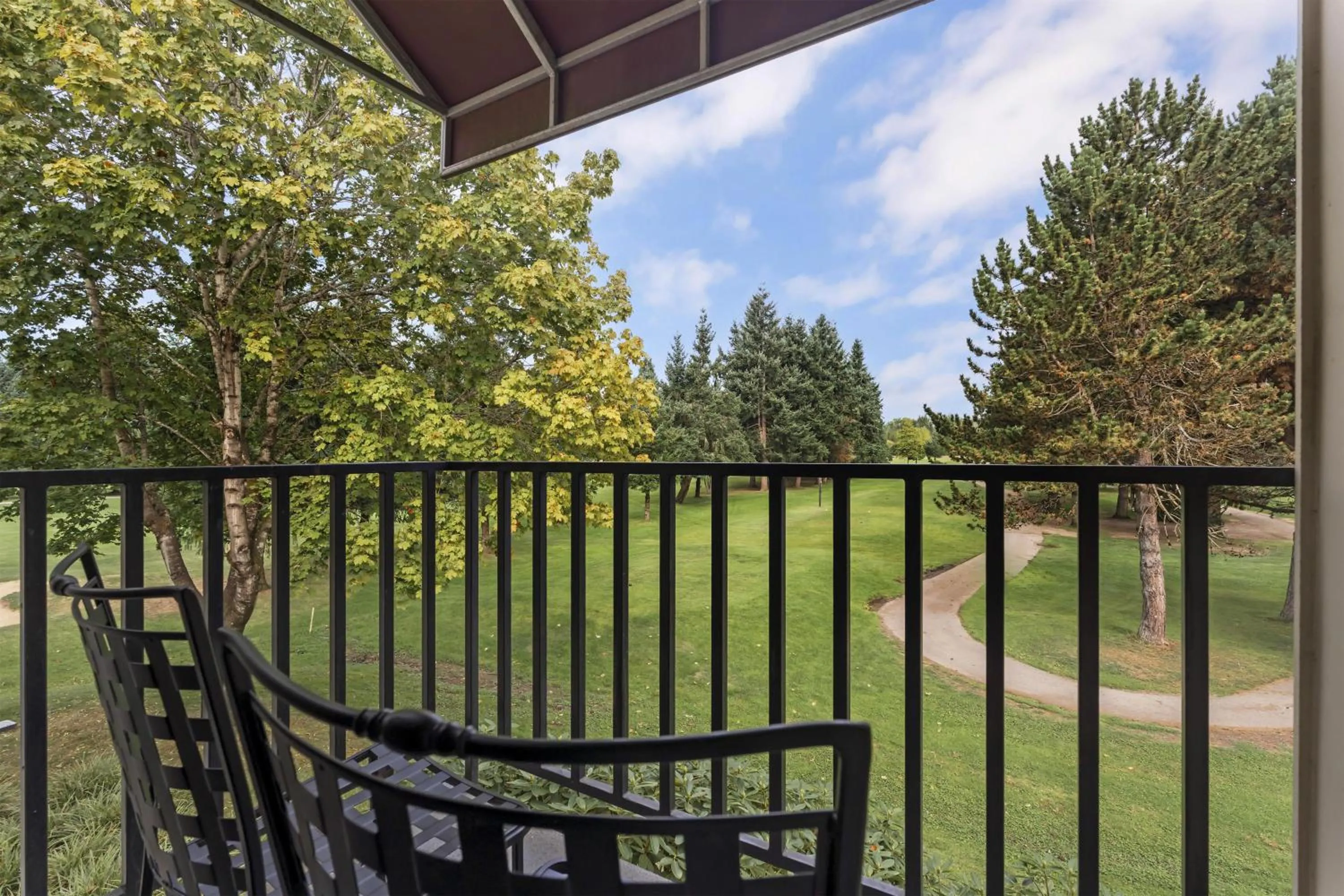 Queen Room with Two Queen Beds and Balcony - Golf Course View in Best Western Plus Plaza by the Green