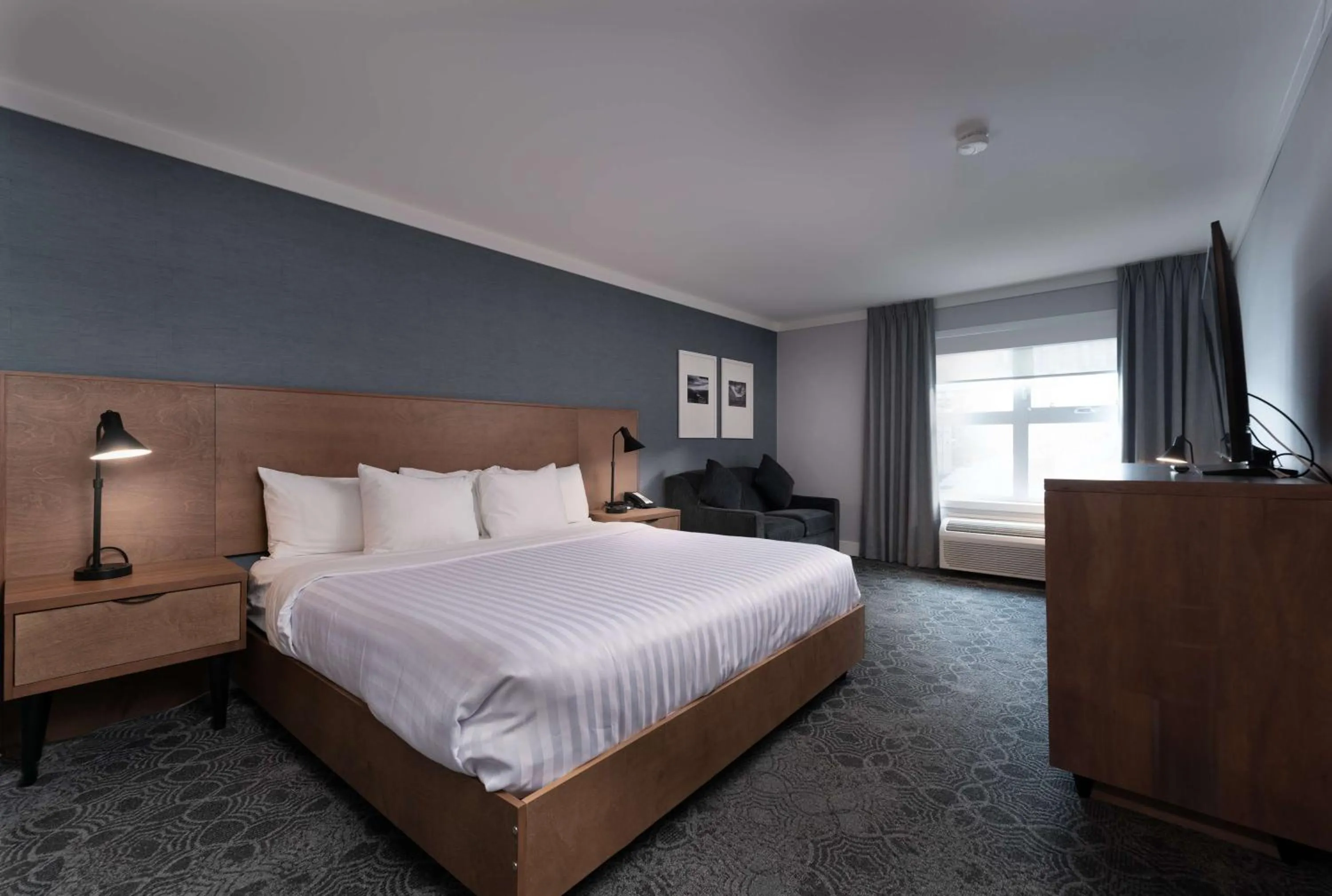 King Suite with One King Bed and Two Queen Beds in Prestige Kamloops Hotel