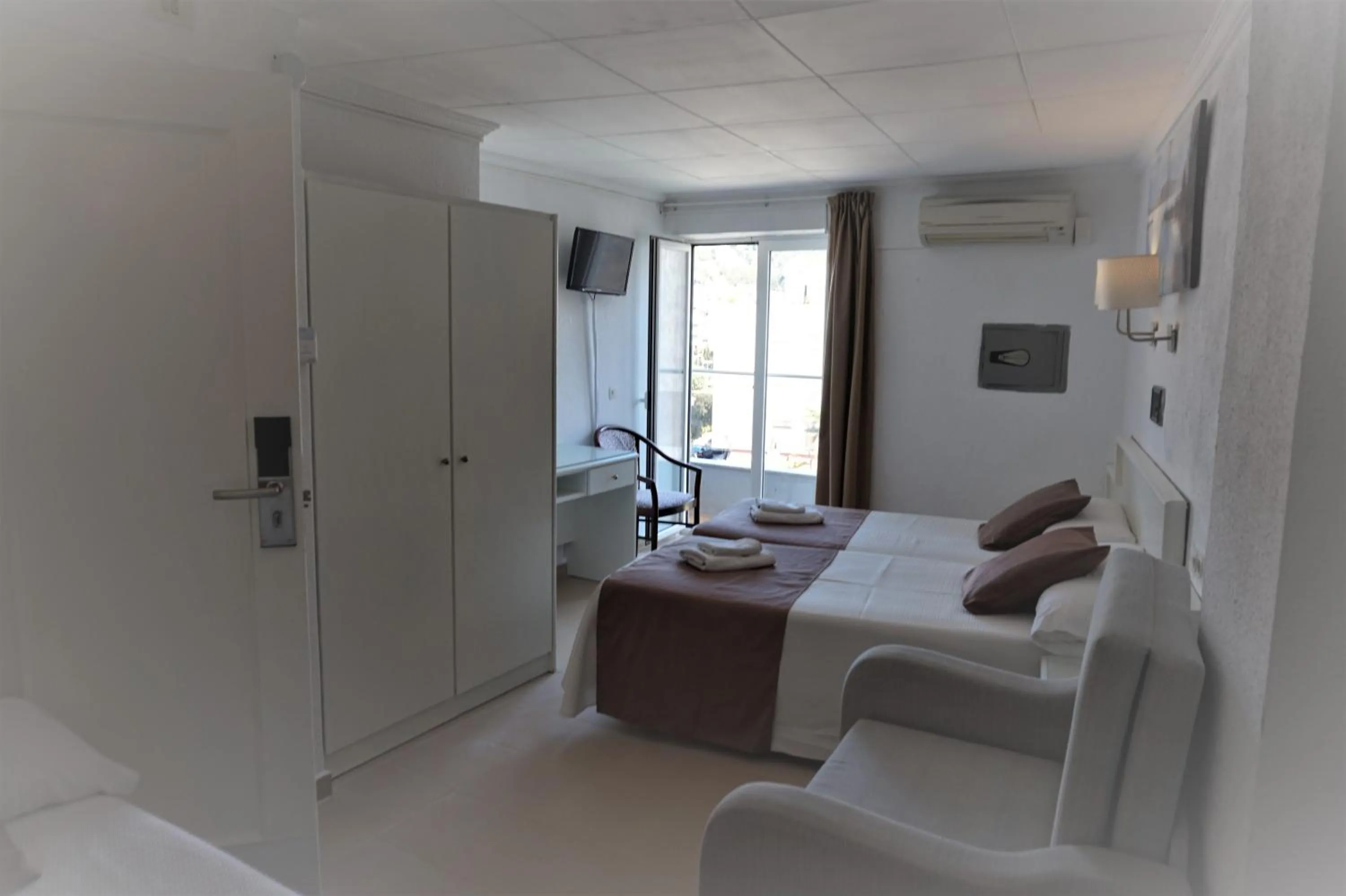 Quadruple Room in Hotel Hermes