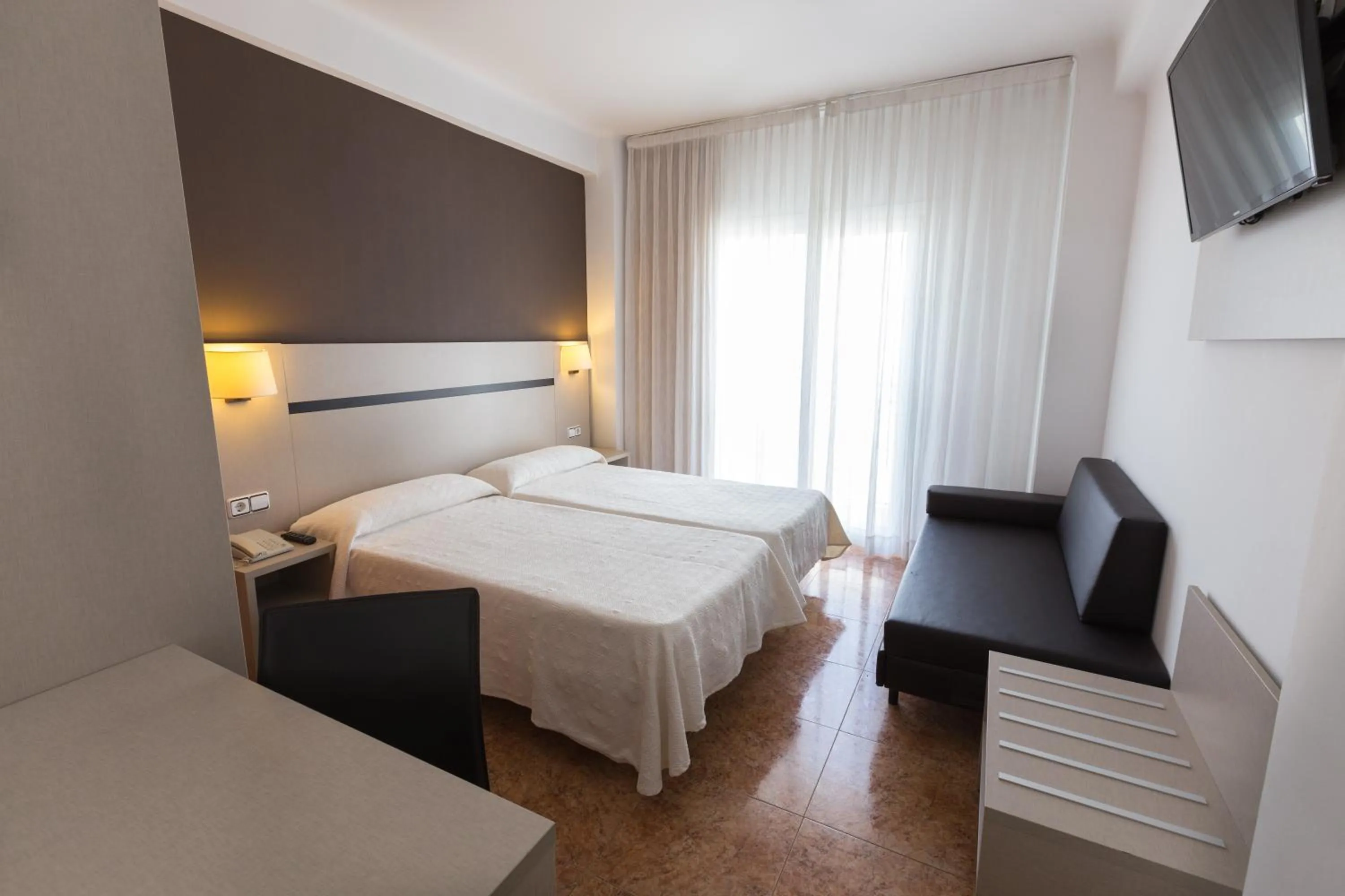Standard Triple Room (2 Adults + 1 Child) with Balcony in Hotel Costa Brava