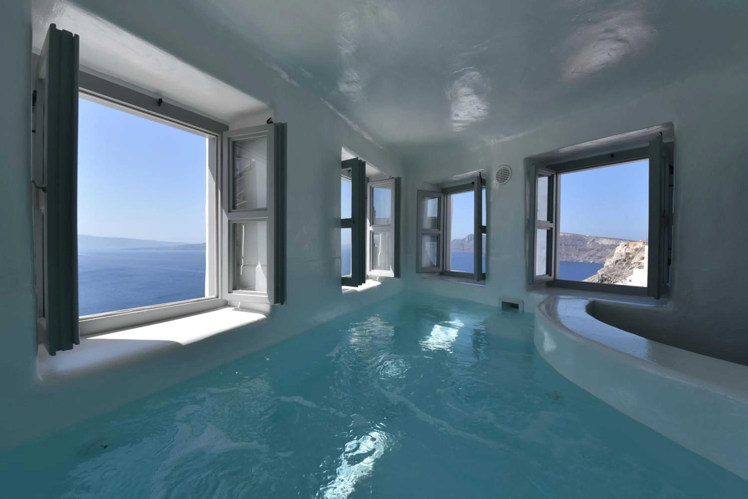 Deluxe Suite with Indoor Plunge Pool and Caldera View in Ducato di Oia - Adults Only