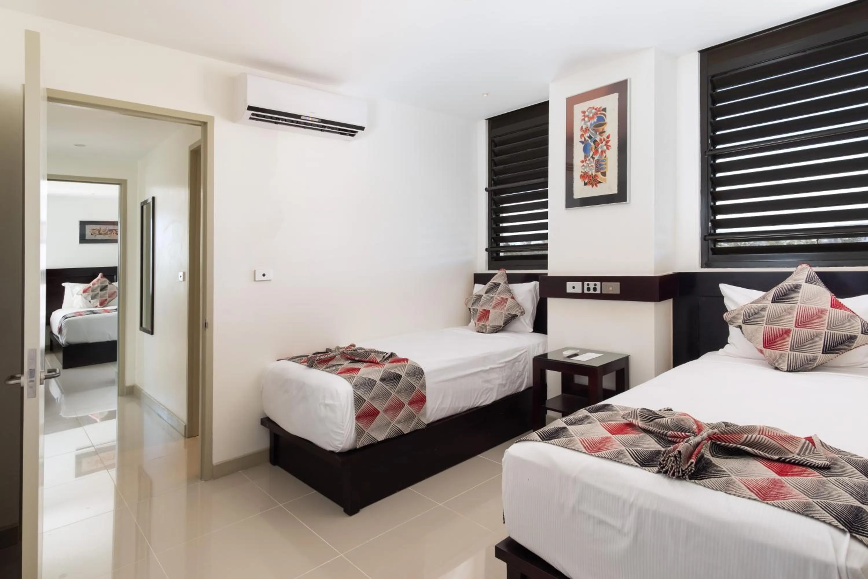 Two-Bedroom Suite with Partial Sea View in Ramada Suites by Wyndham Wailoaloa Beach Fiji