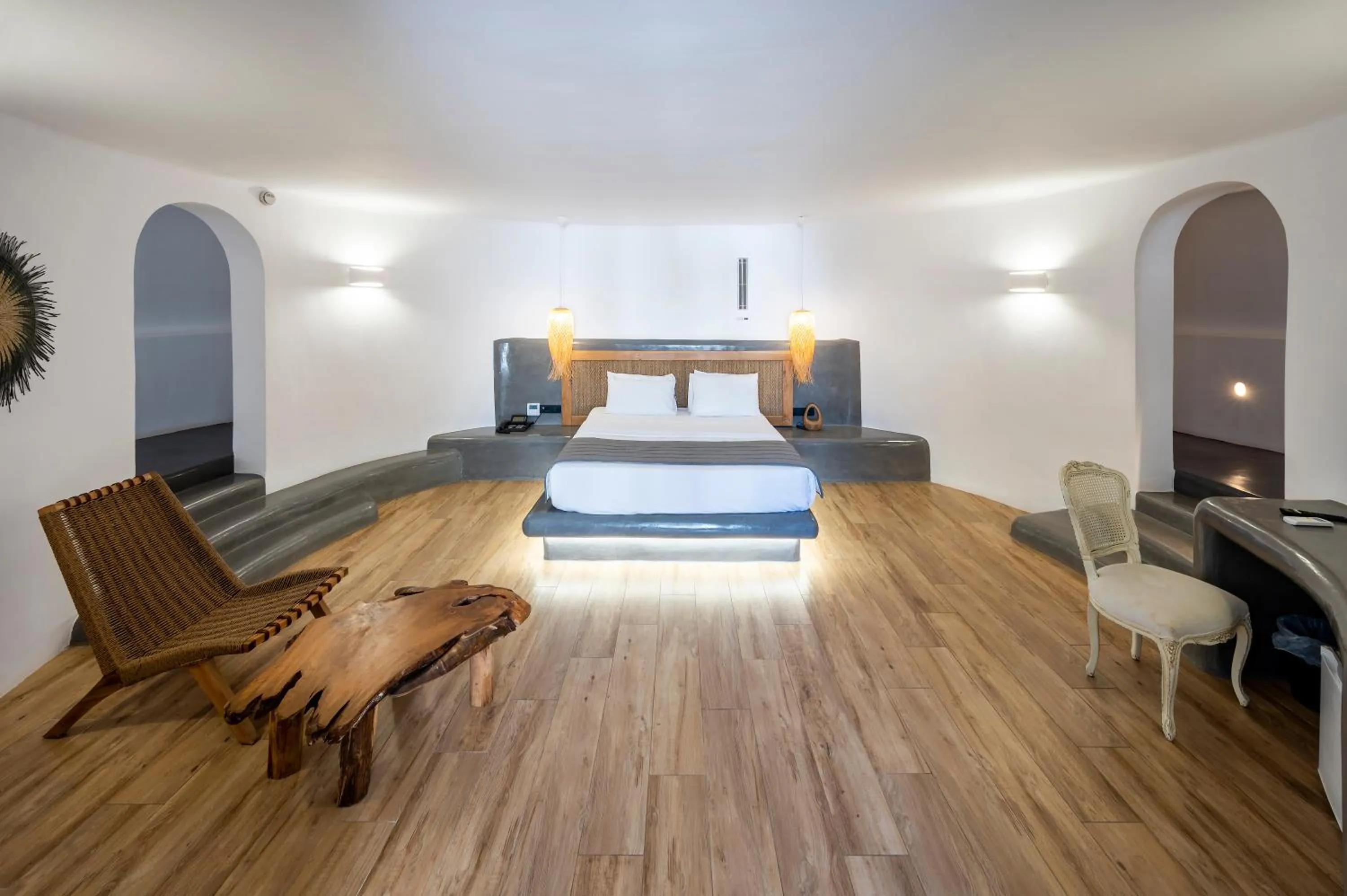 Windmill Deluxe Suite with shared pool in Smy Mediterranean White Santorini