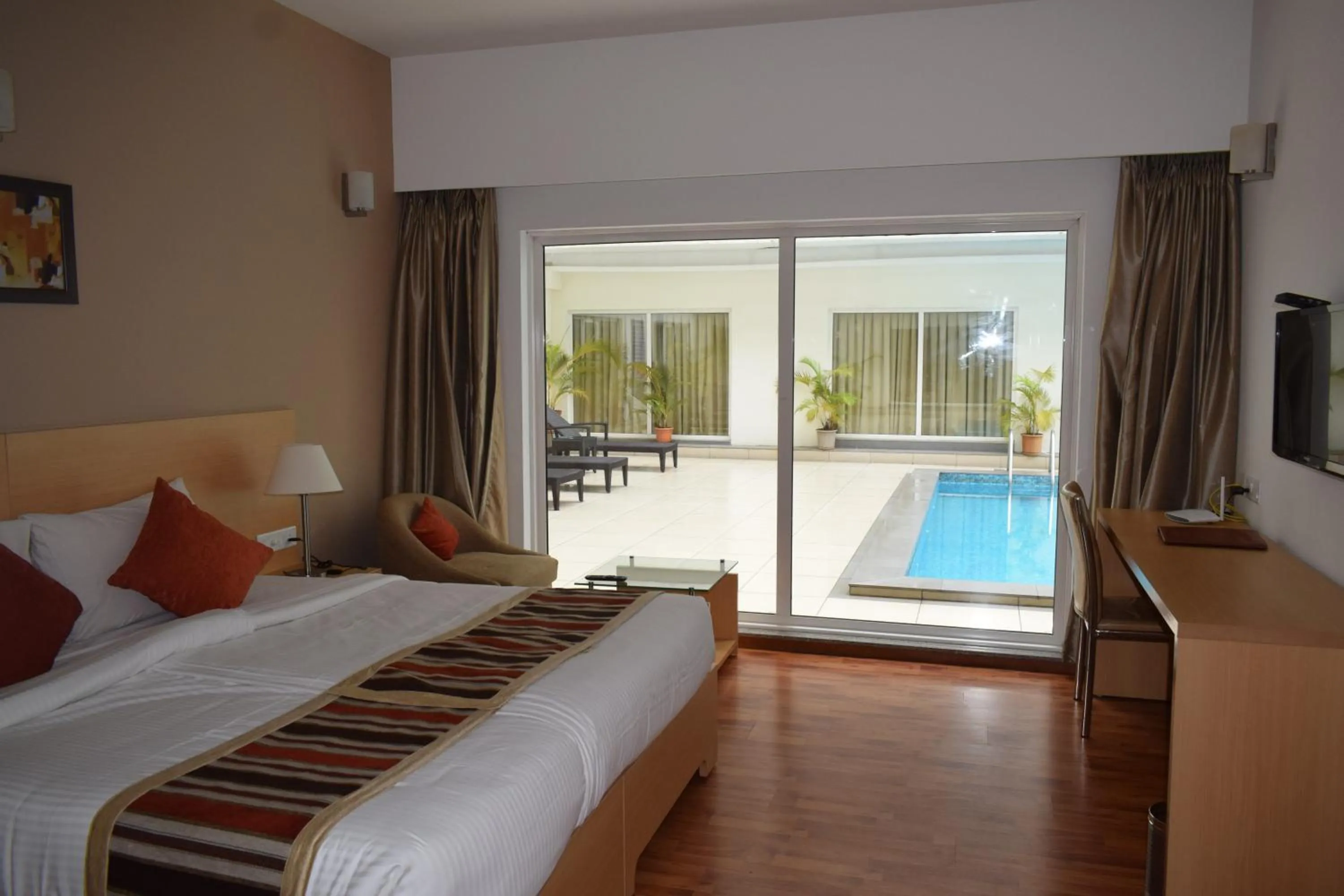 Superior Deluxe Suite with Pool View - single occupancy in Starlit Suites Kochi
