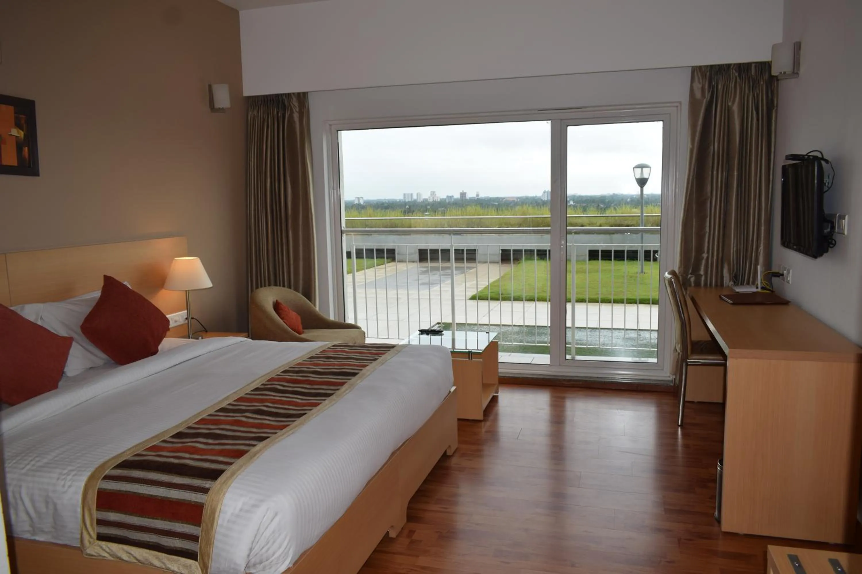 Premium Double or Twin Room with Balcony - single occupancy in Starlit Suites Kochi