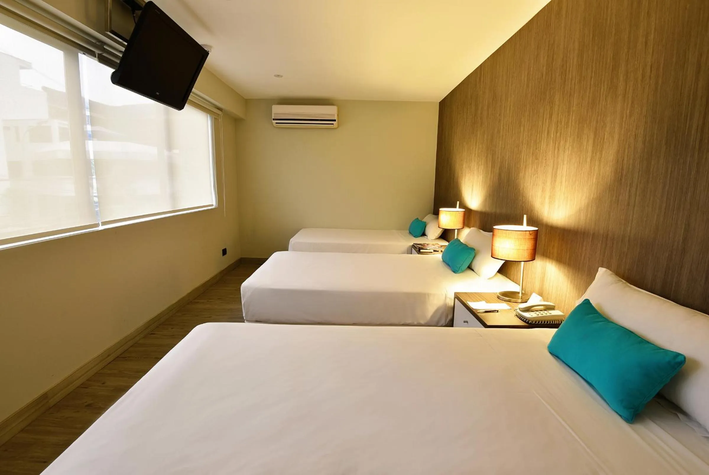 Triple Room in Mariel Hotel Boutique