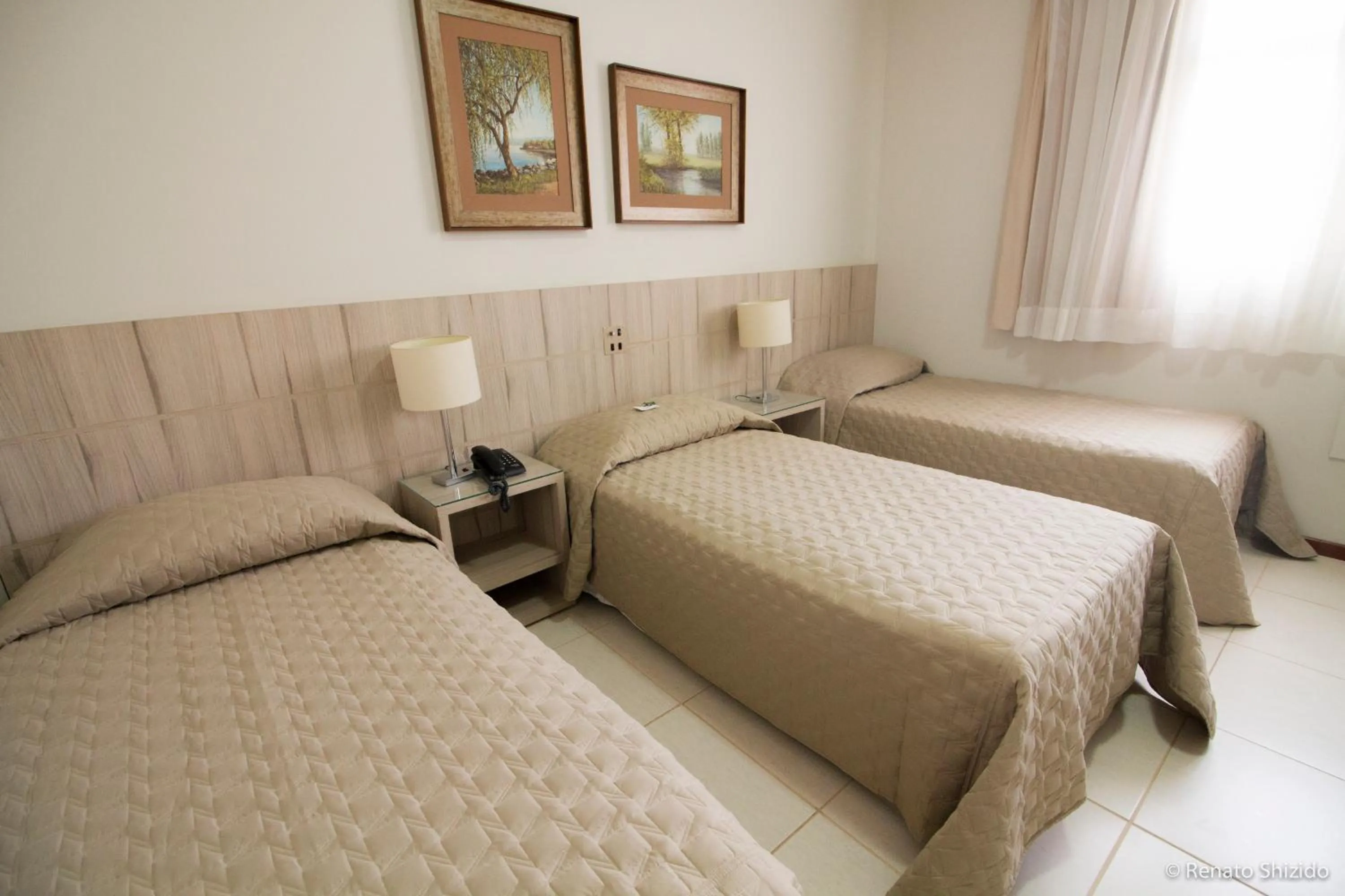 Deluxe Triple Room - single occupancy in Aruá Hotel, Restaurante e Convenções