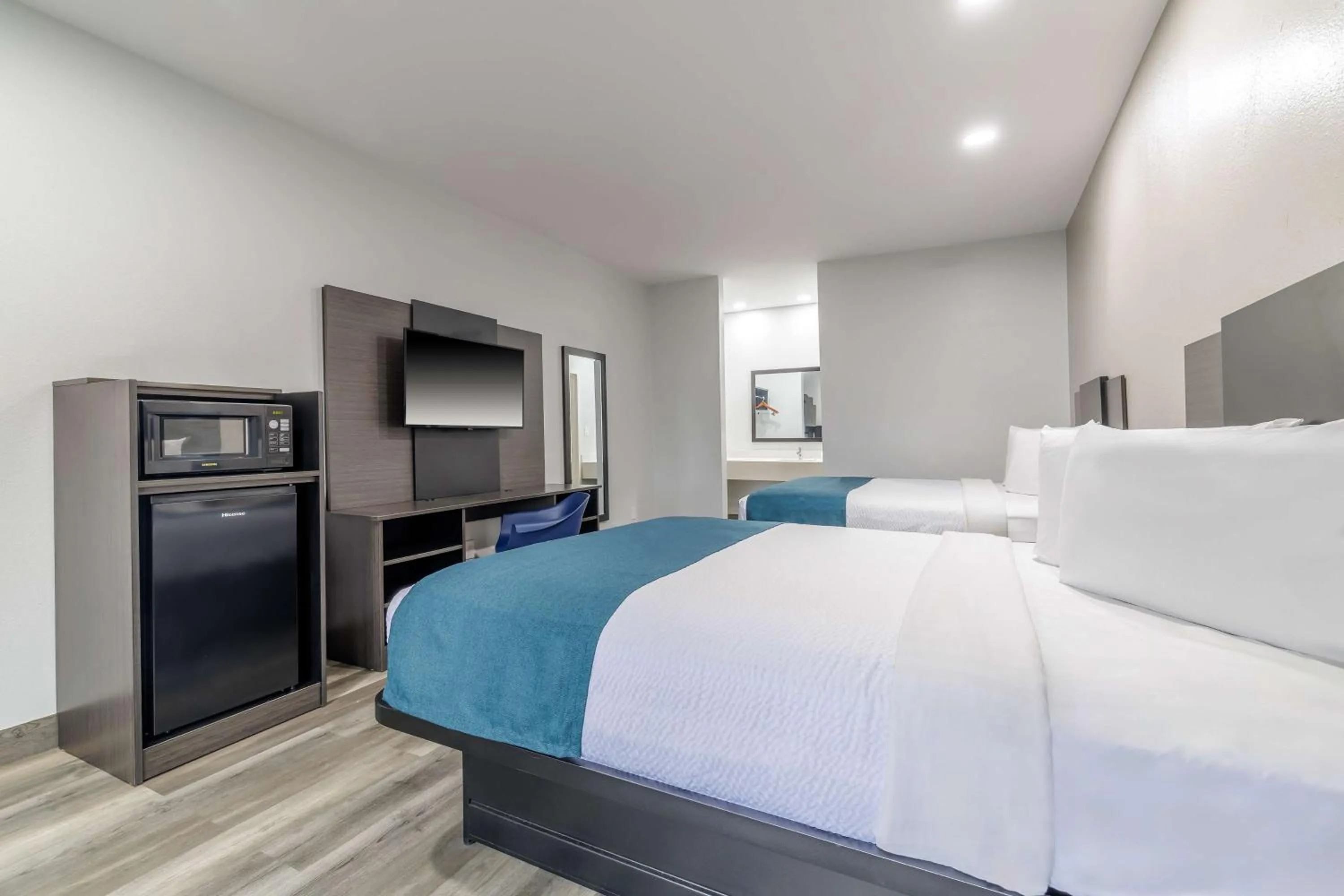 Deluxe Queen Room with Two Queen Beds - Non-Smoking in Motel 6-Brenham, TX