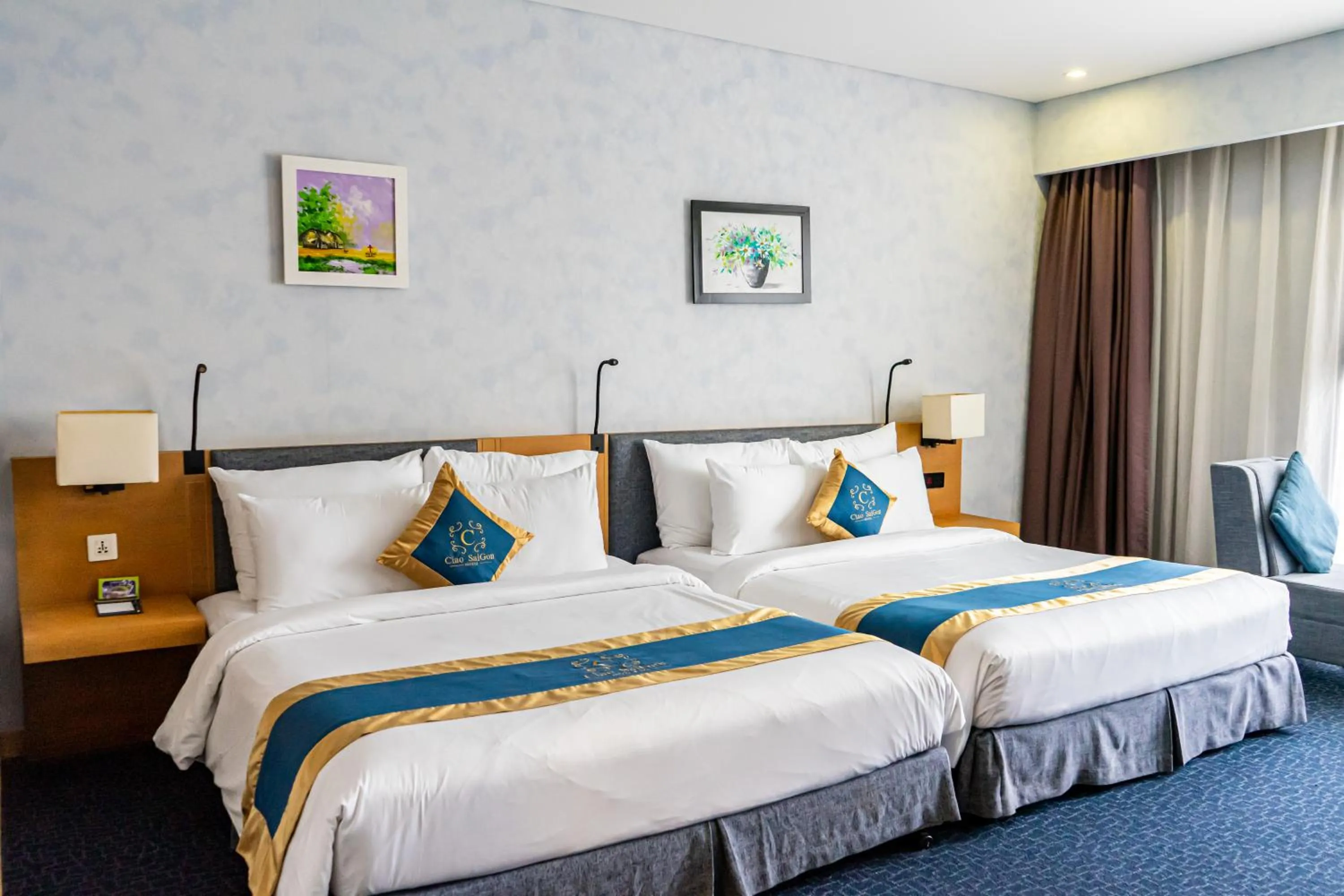 Family Room (4 Adults) with window in Ciao SaiGon Hotel & Spa