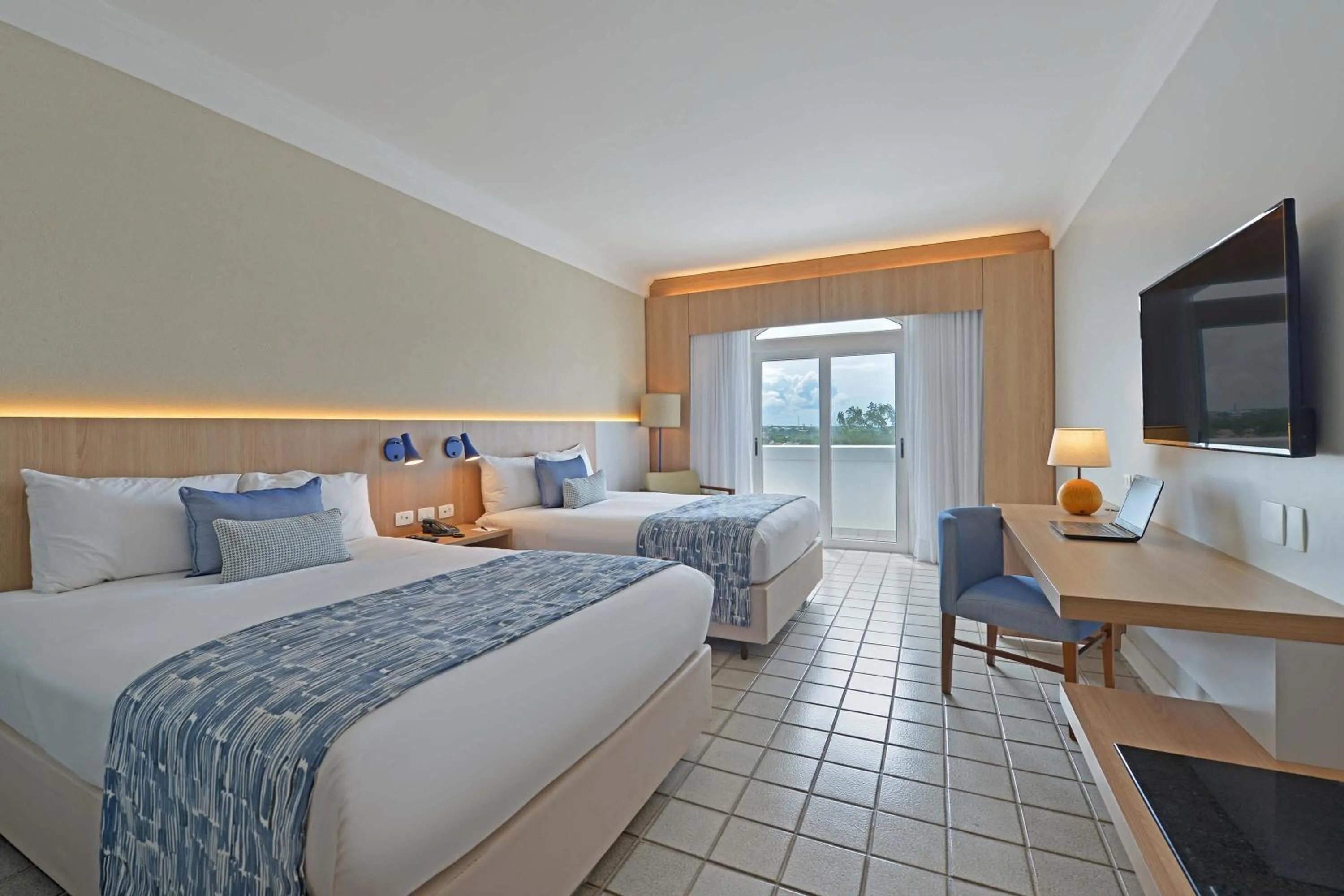 Superior Luxury Room with 2 double beds and partial sea view in Hotel Deville Prime Salvador