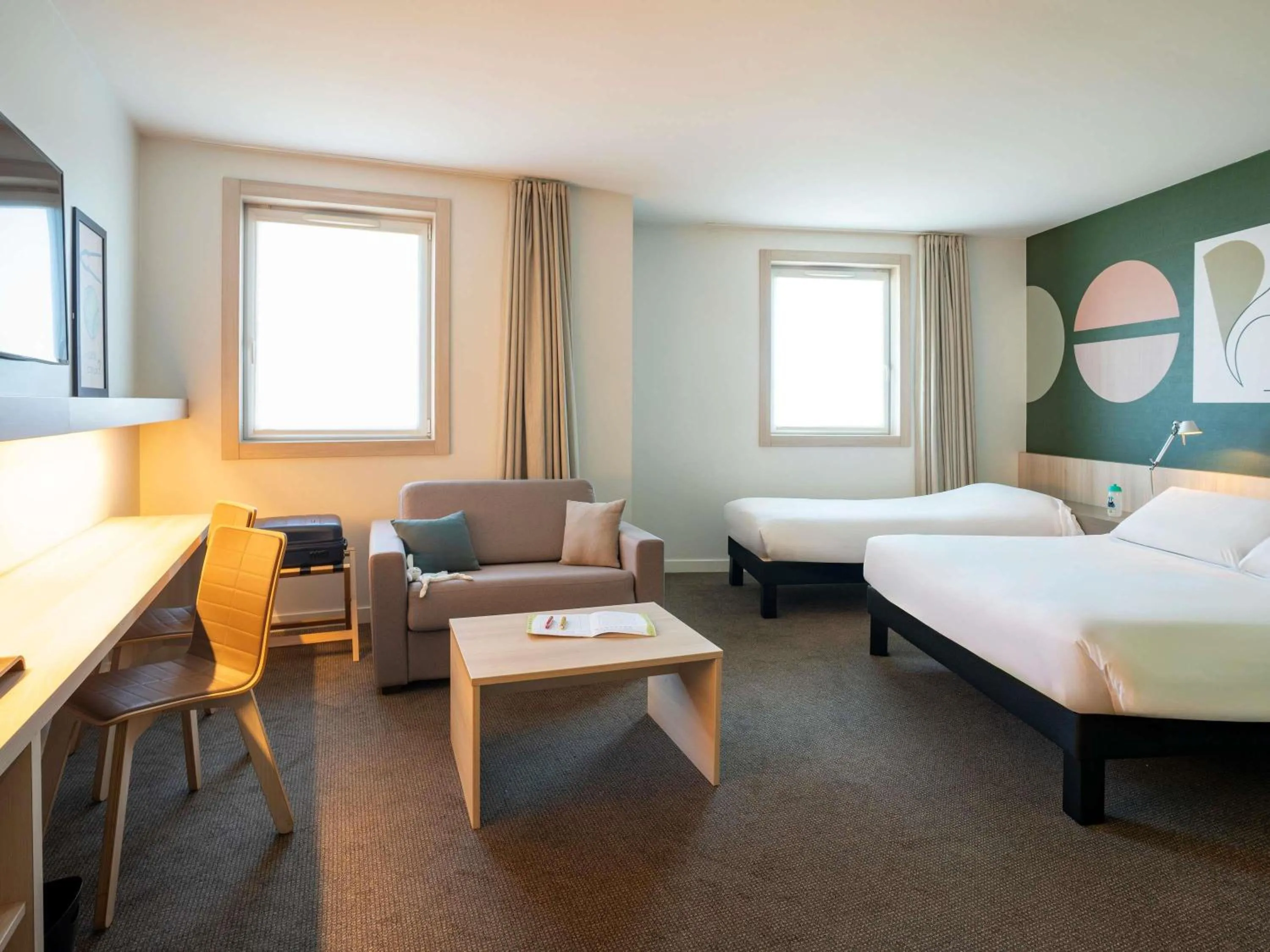 Family Room with One Double, One Single and One Bunk Bed in ibis Styles Guéret