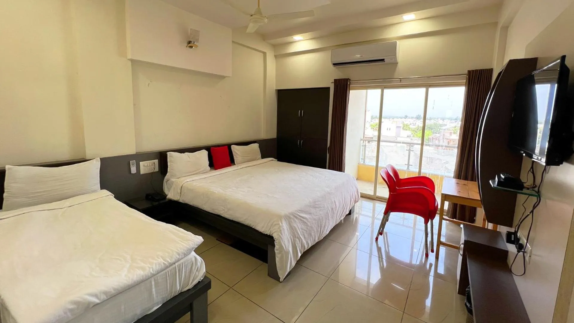 Deluxe Triple Room in The Gir Harmony Hotel