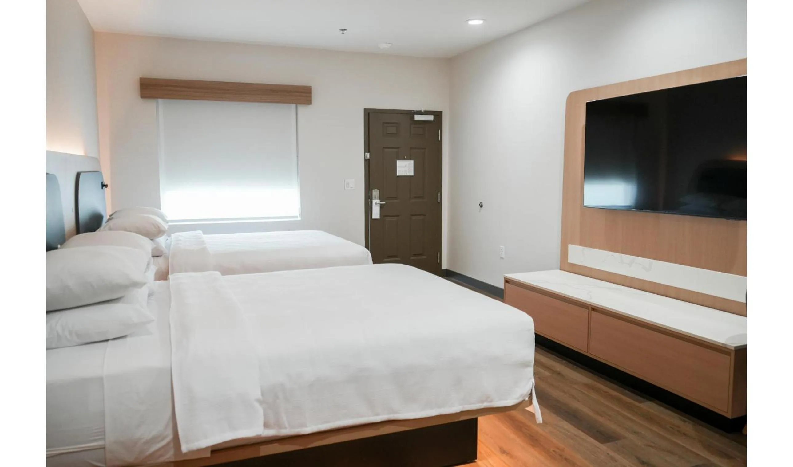 Premium Kitchenette Room with Two Queen Beds- Hearing Accessible in Hotel Lydia