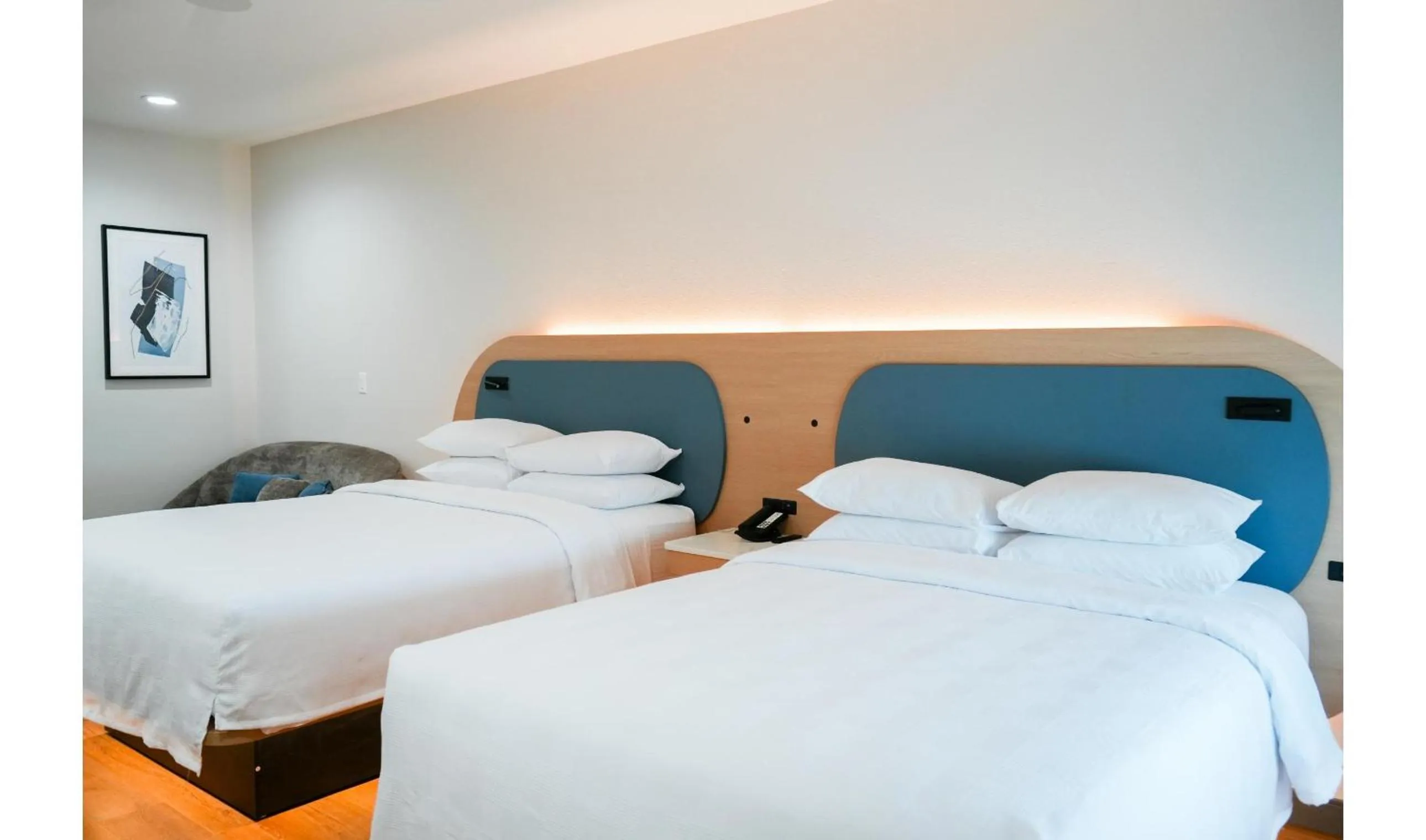 Premium Kitchenette Room with Two Queen Beds and Balcony in Hotel Lydia