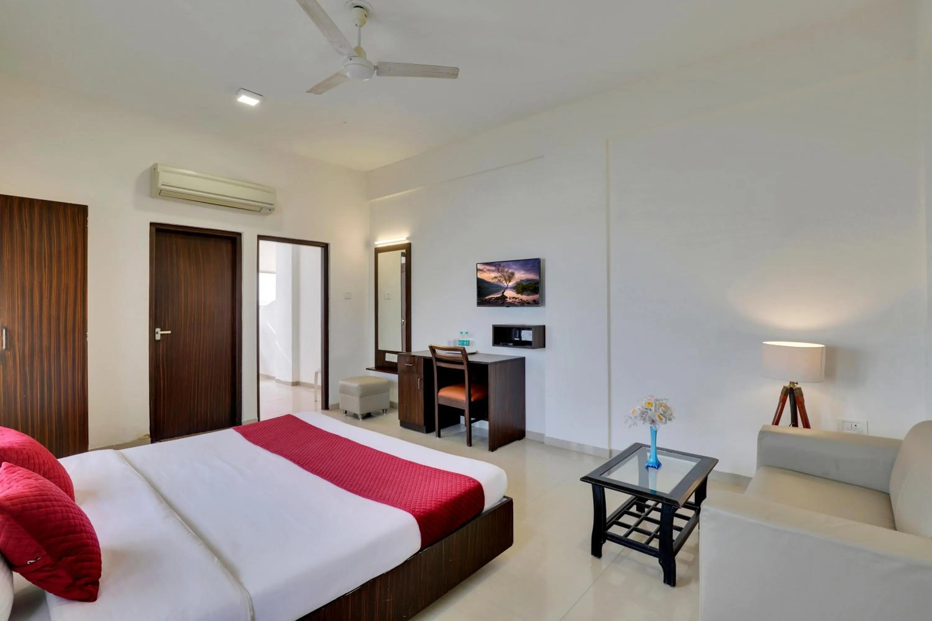 Super Deluxe Room with Balcony - single occupancy in Goverdhan Greens Resort Dwarka l Hotels In Dwarka