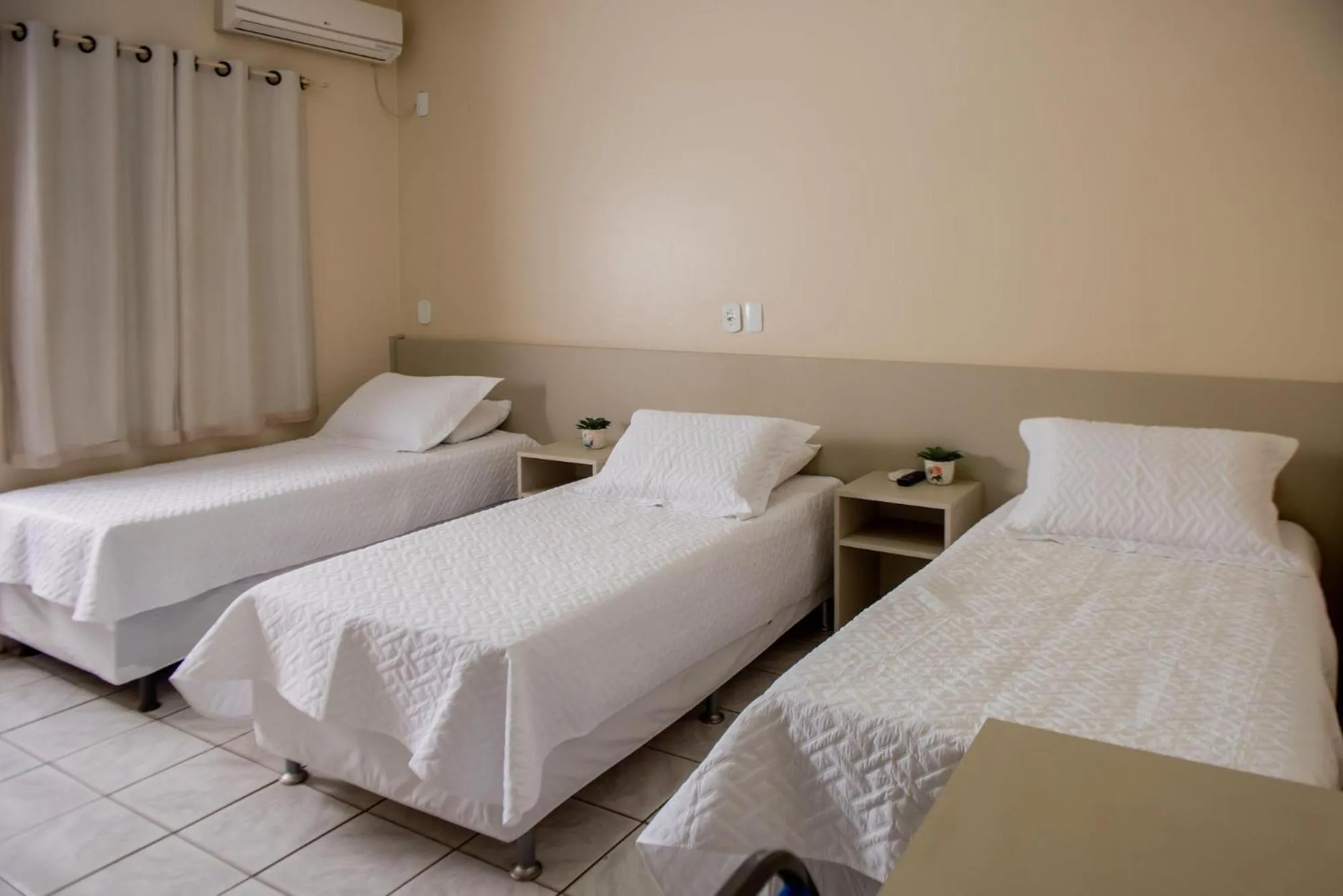 Deluxe Triple Room in Hotel Tropical Garden