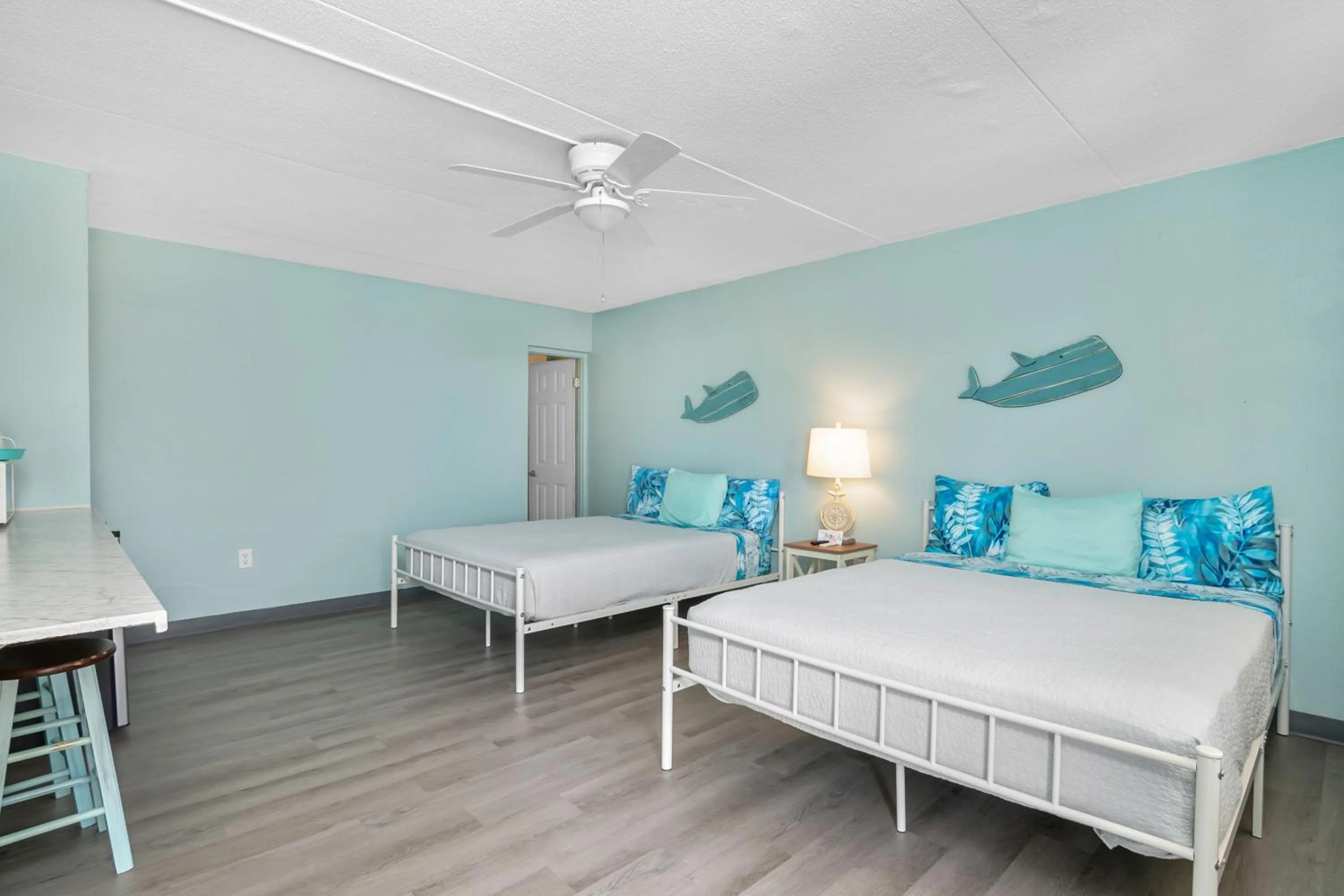 Deluxe Queen Room with Two Queen Beds in Latitude 26 Waterfront Boutique Resort - Fort Myers Beach