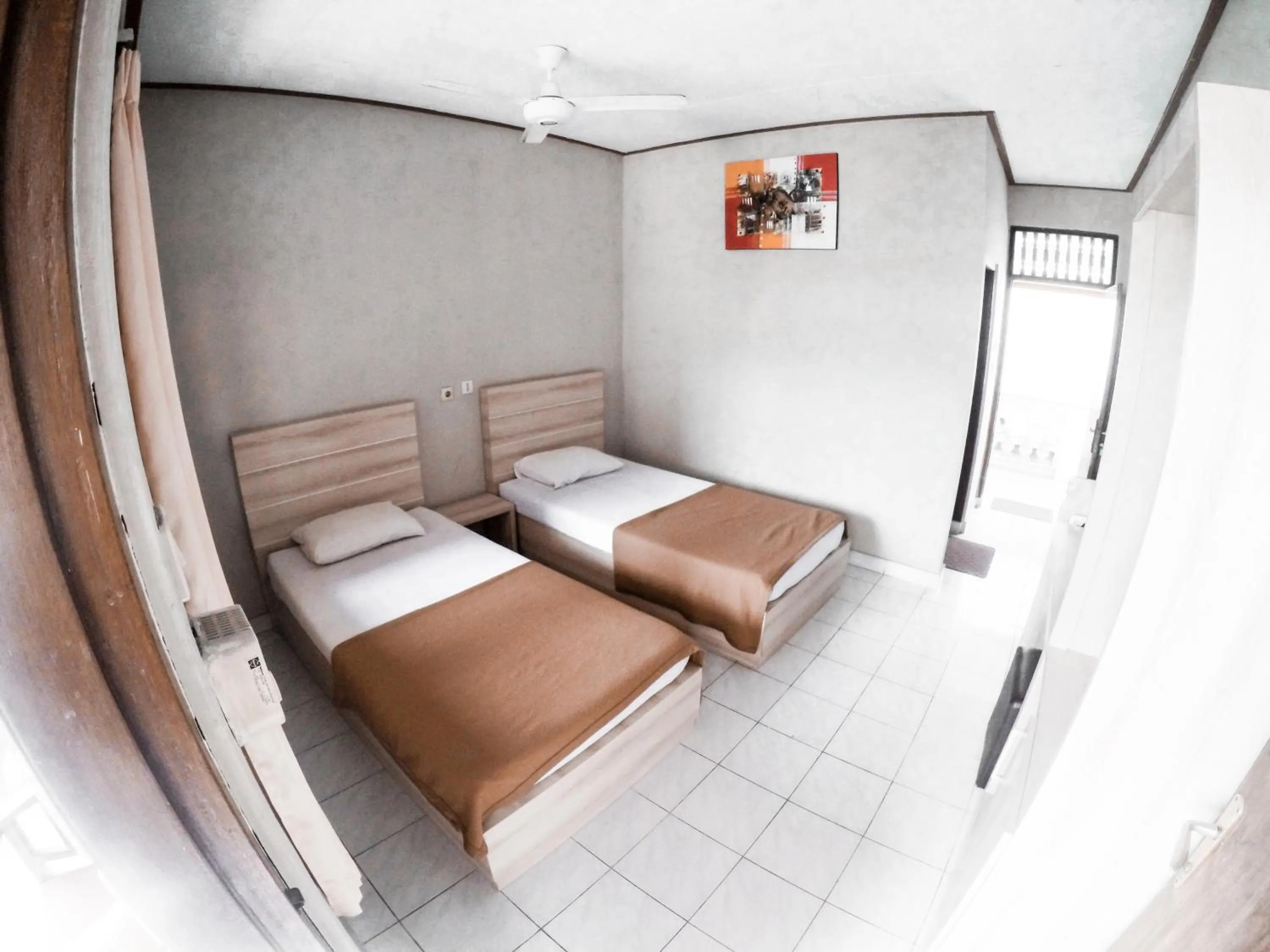 Standard Double Room with Fan in Palm Garden Kuta