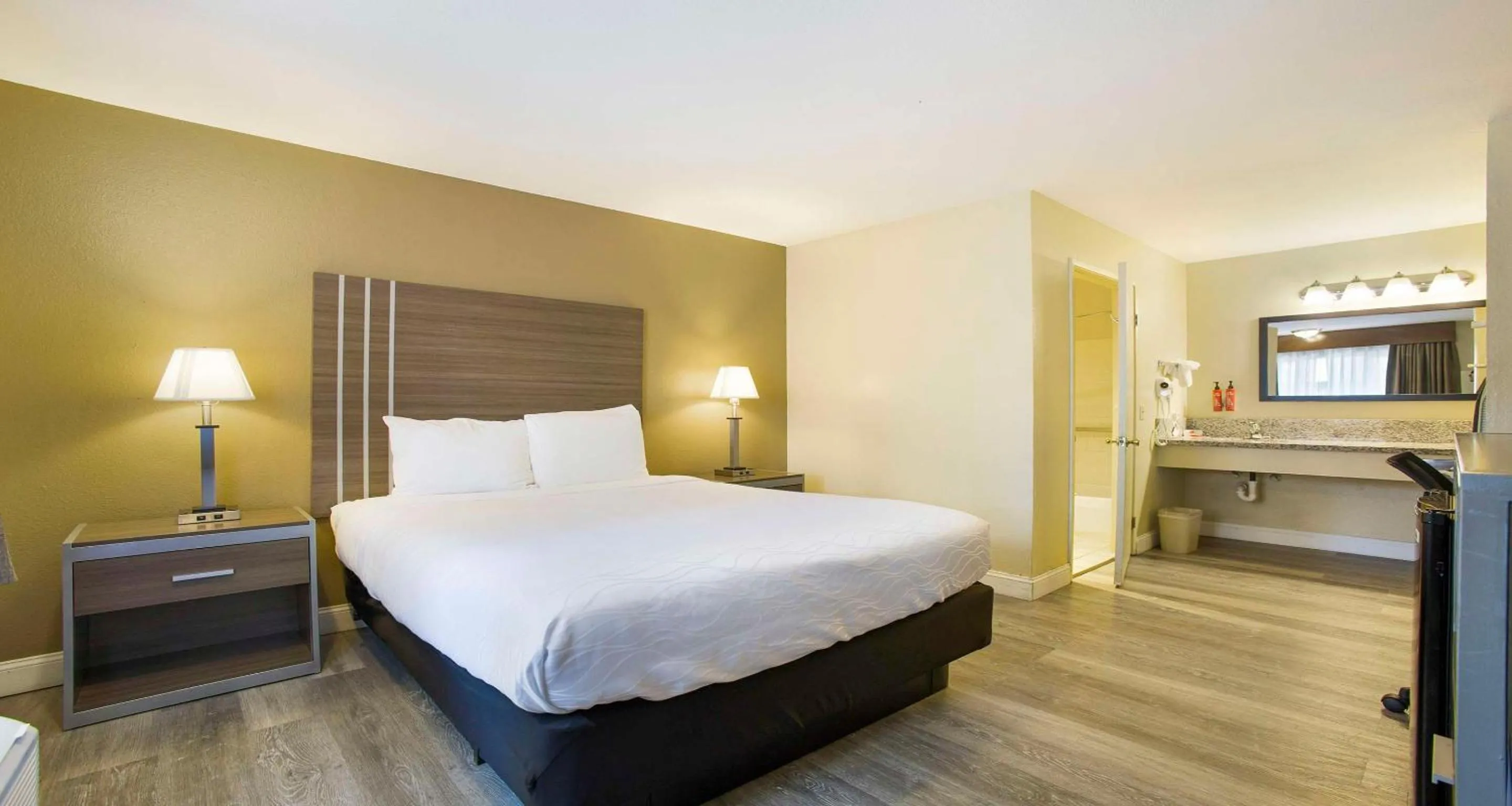 King Room with Balcony - Garden View in SureStay Plus Hotel by Best Western Sacramento North