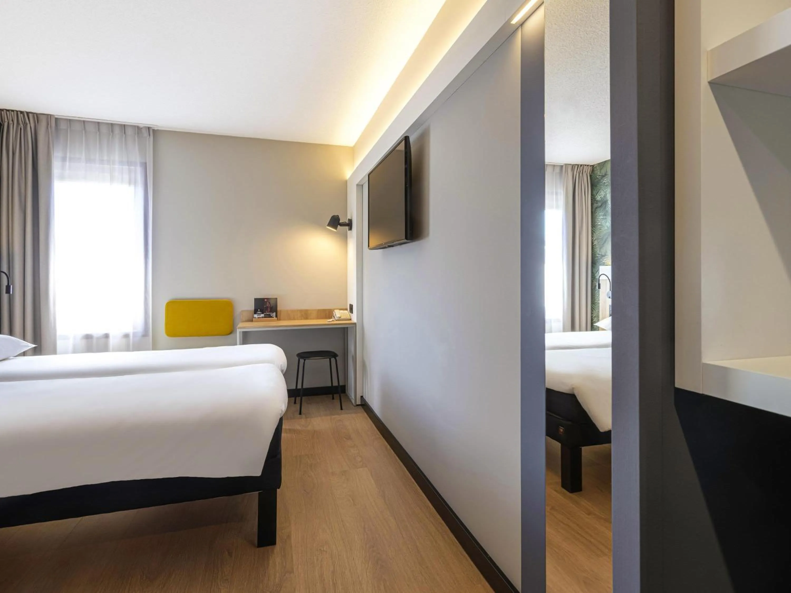 Triple Room with One Double and Single Bed or Three Single Beds in ibis Brussels Waterloo