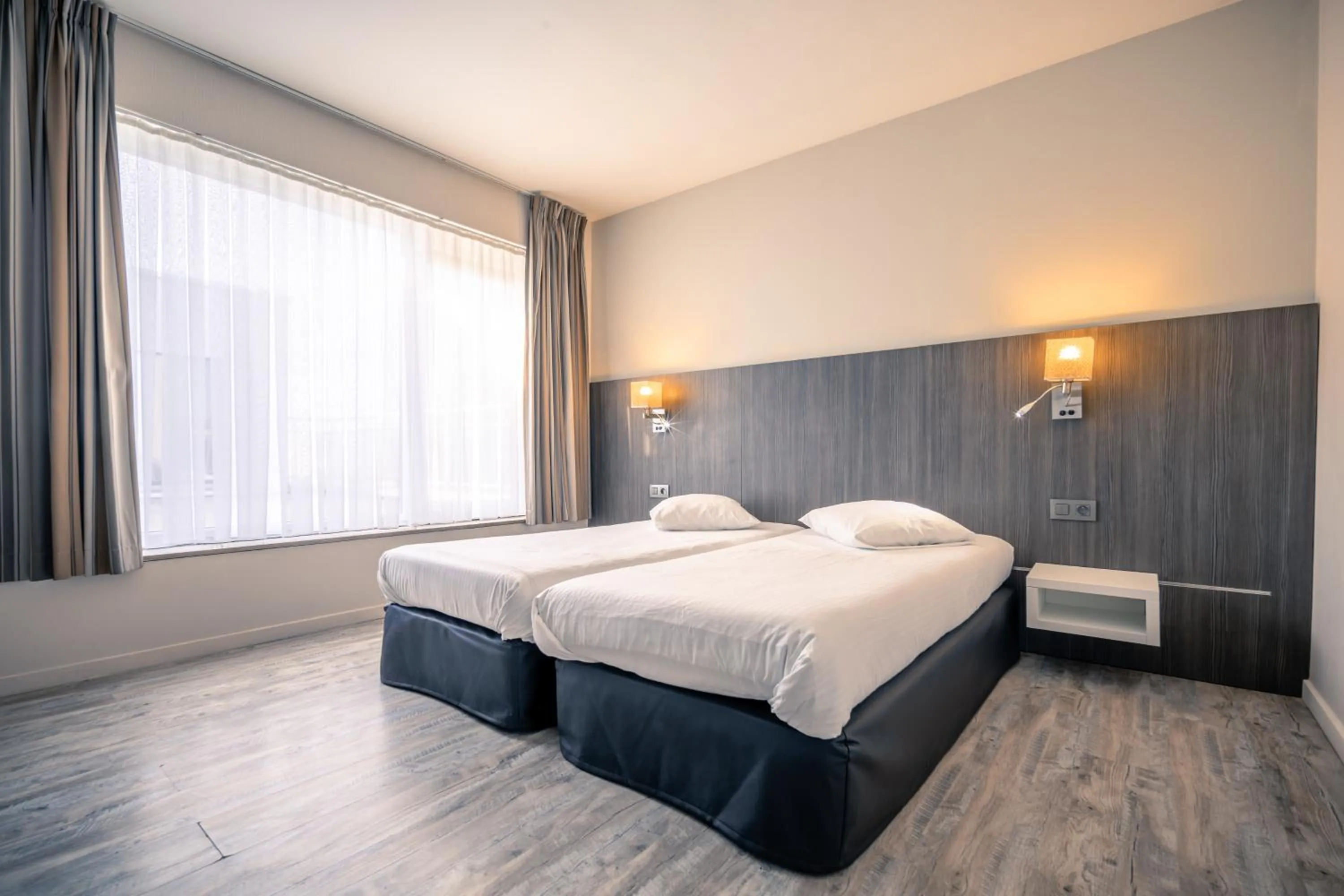 Superior Quadruple Room with Spa Access in Hotel & Wellness Royal Astrid