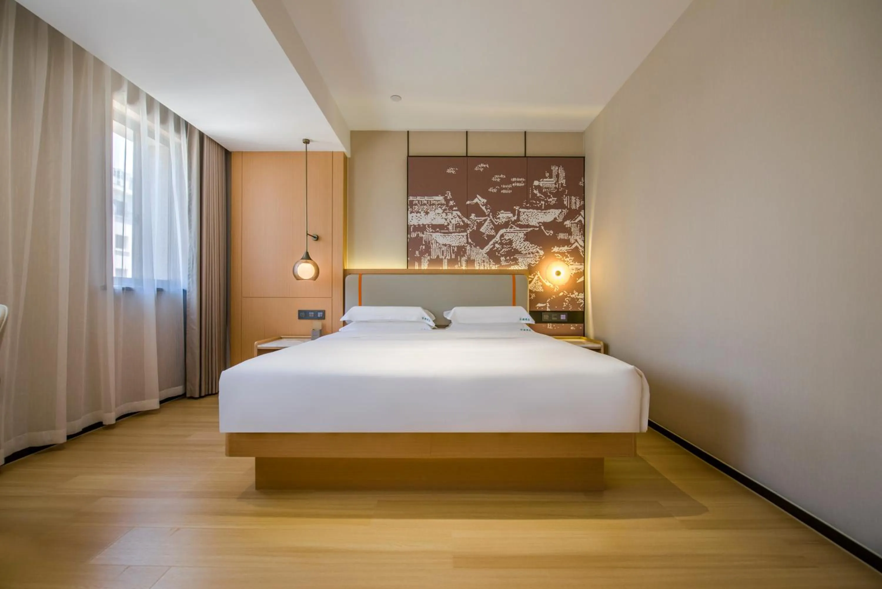 Triple Room with Shared Toilet in Yiwu Baide Theme Hotel