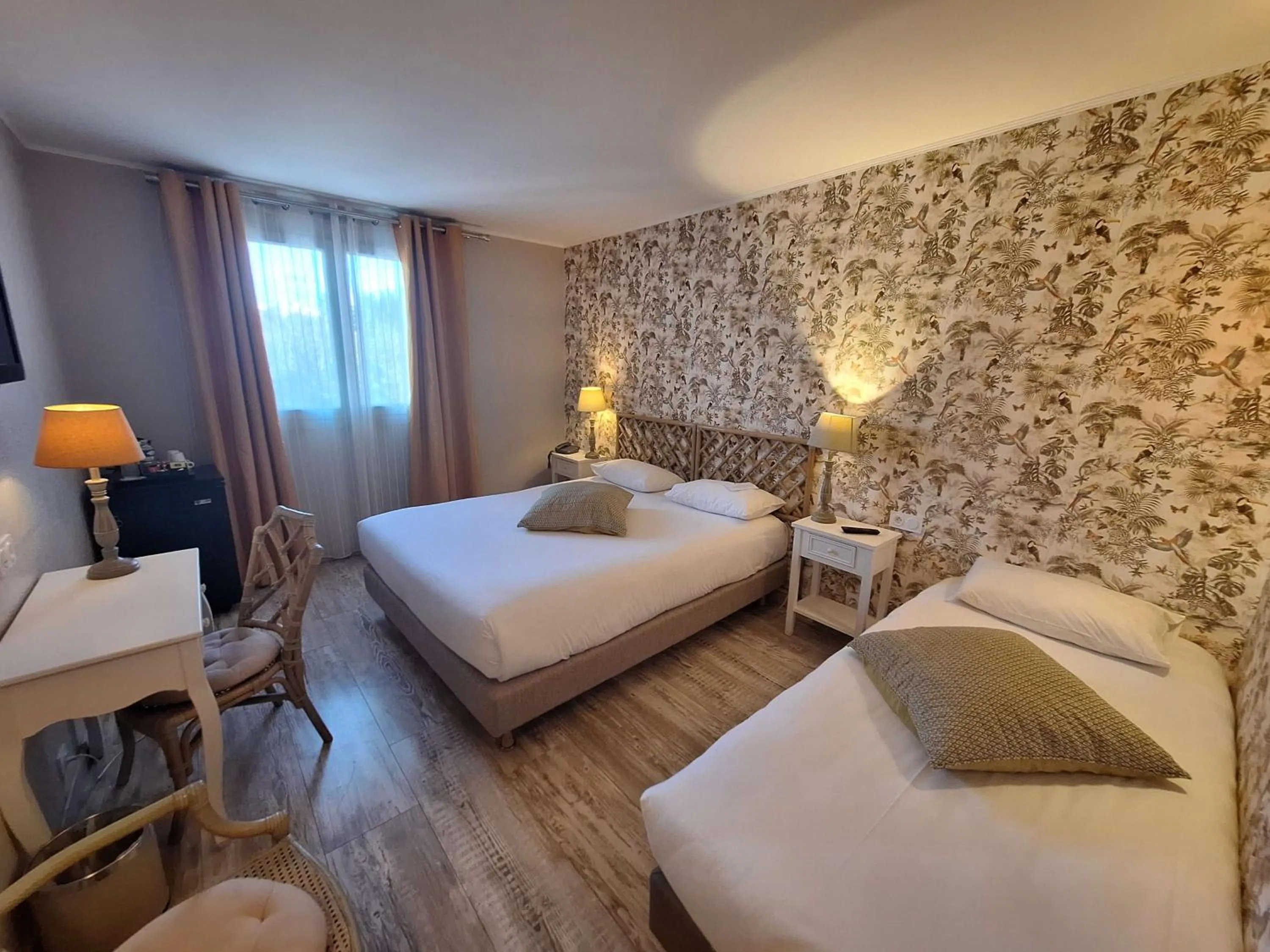 Family Room with One Queen Bed and One Single Bed - Non-Smoking in Best Western L'Orangerie