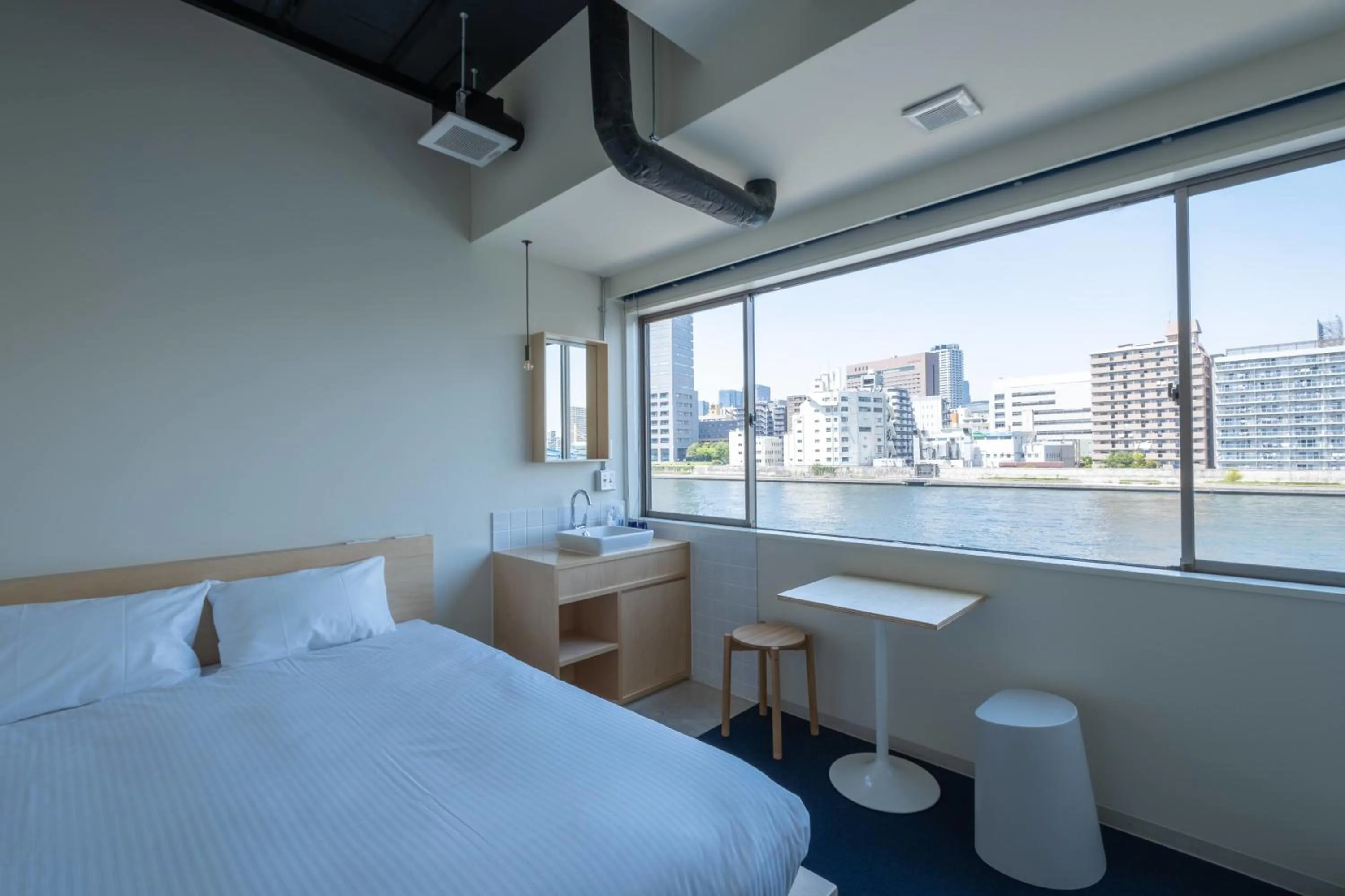 Queen Room with River View and Shared Bathroom in LYURO Tokyo Kiyosumi by THE SHARE HOTELS
