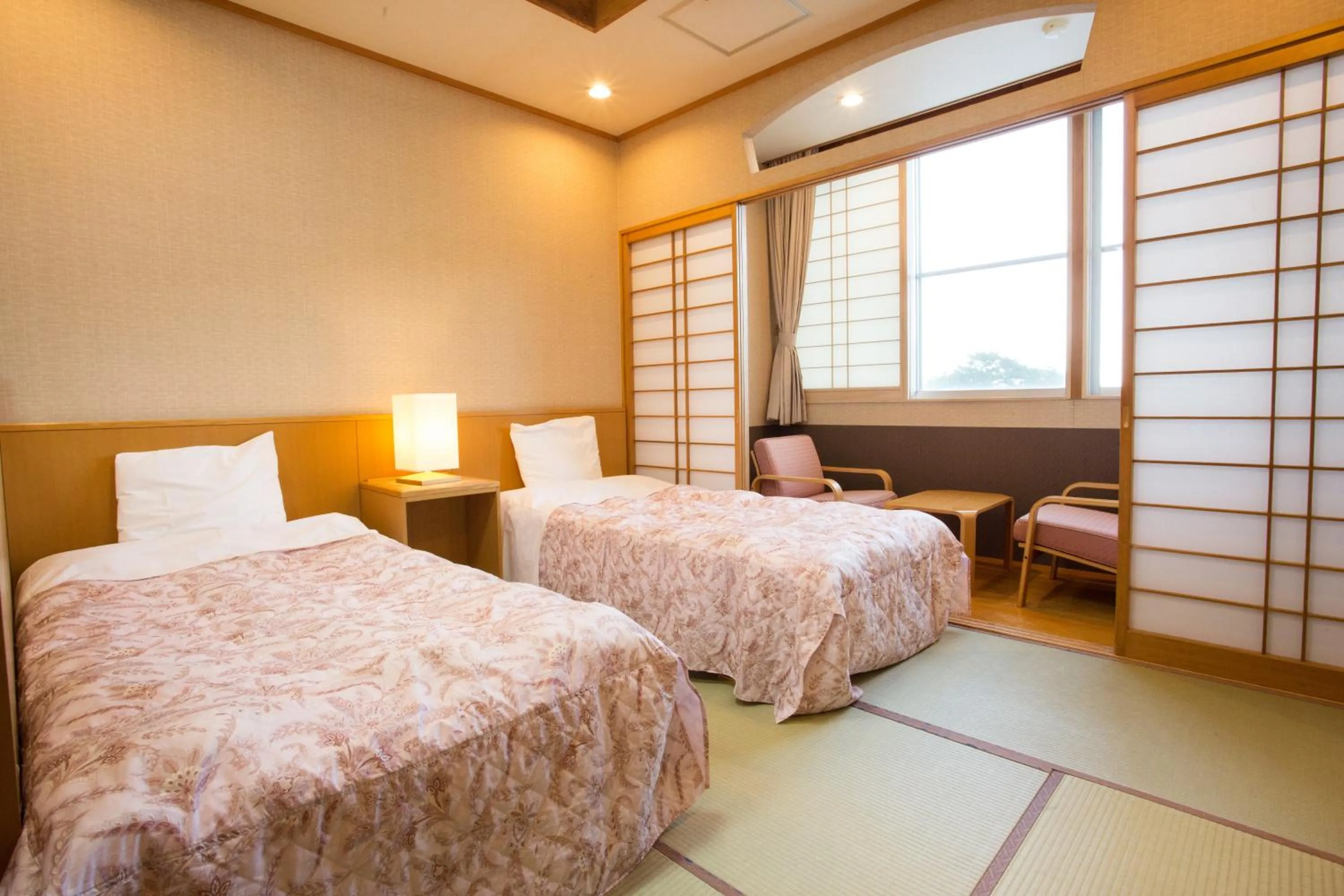 Twin Bed Room with Tatami Area in Hotel Keipu
